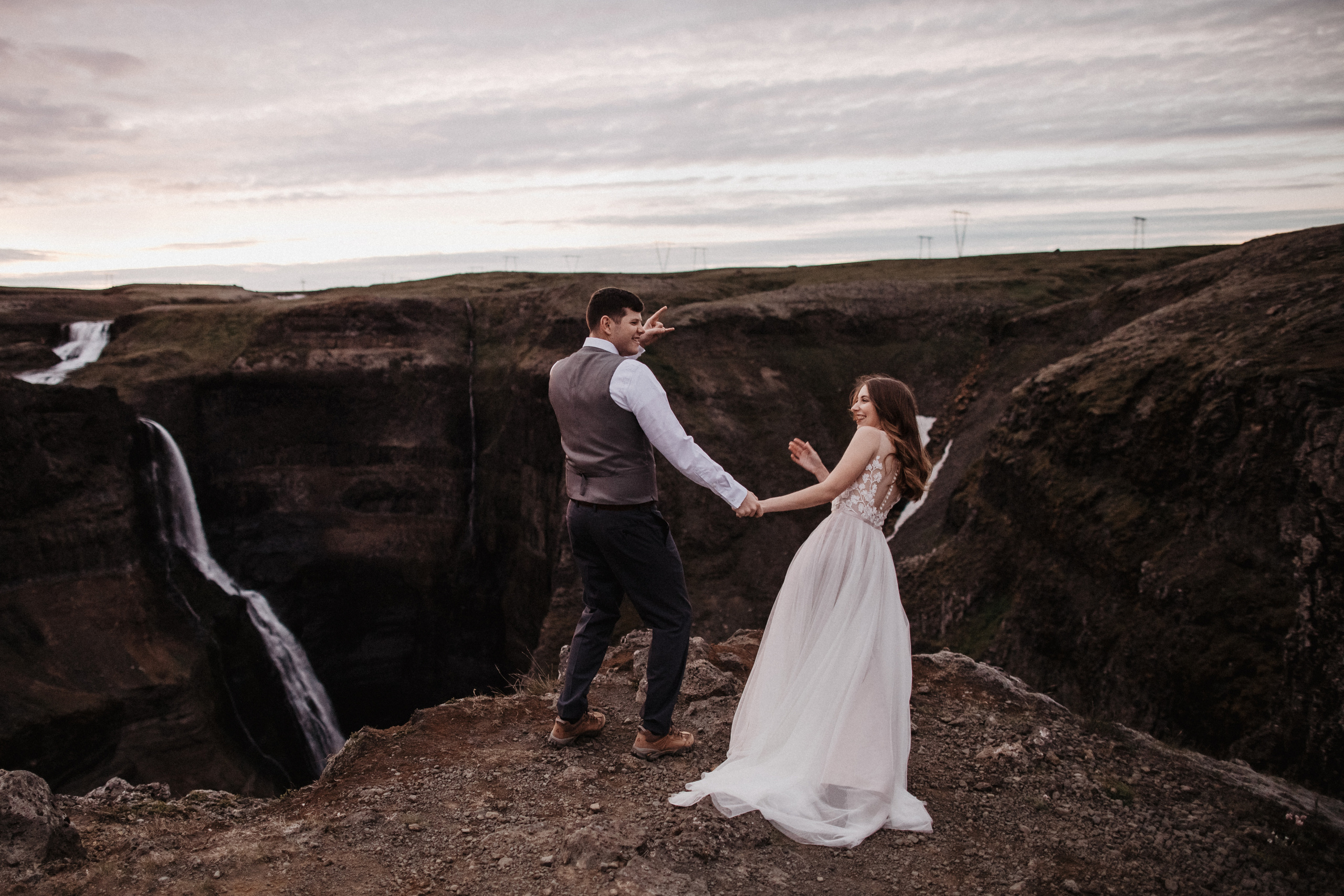 Midnight sun elopement at Haifoss in Iceland. Iceland elopement photographer & videographer