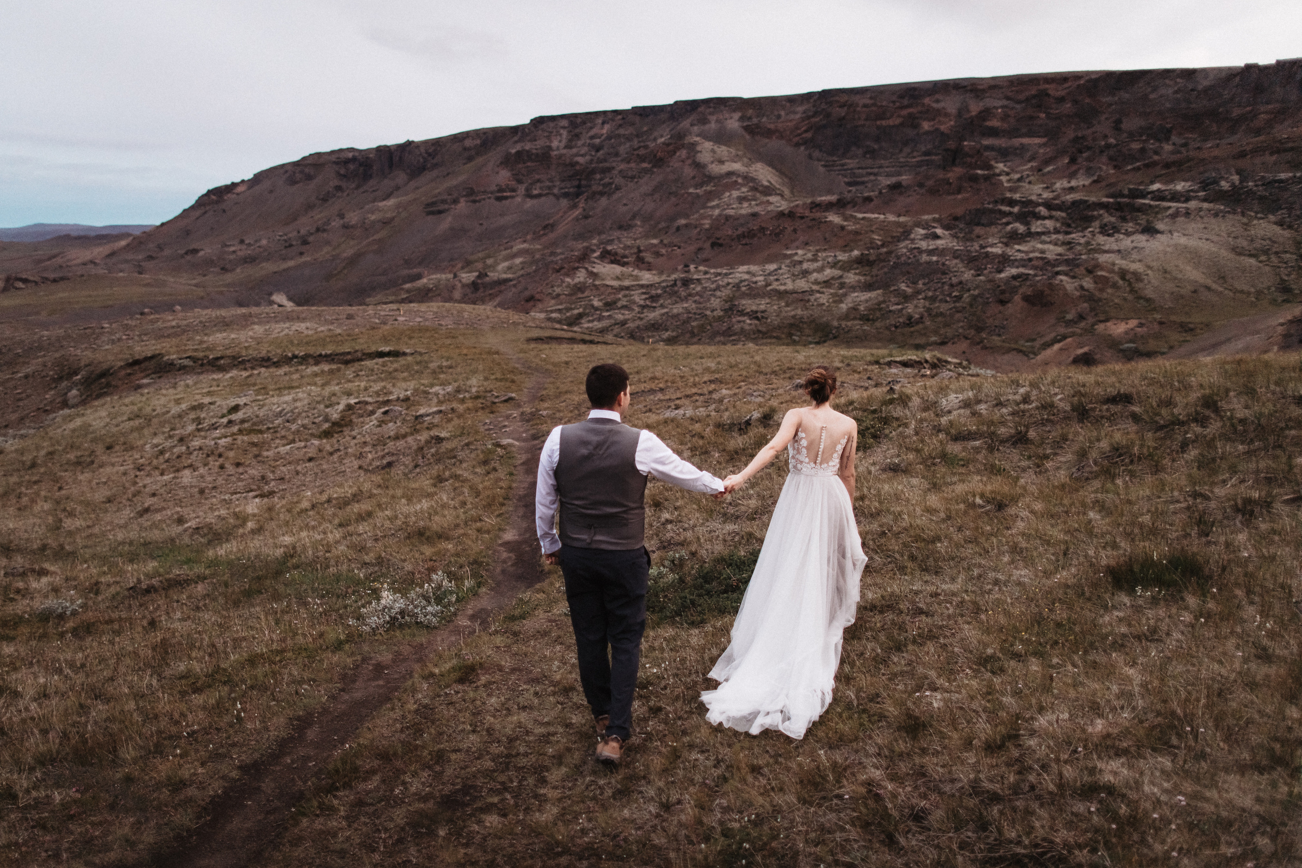 Midnight sun elopement at Haifoss in Iceland. Iceland elopement photographer & videographer