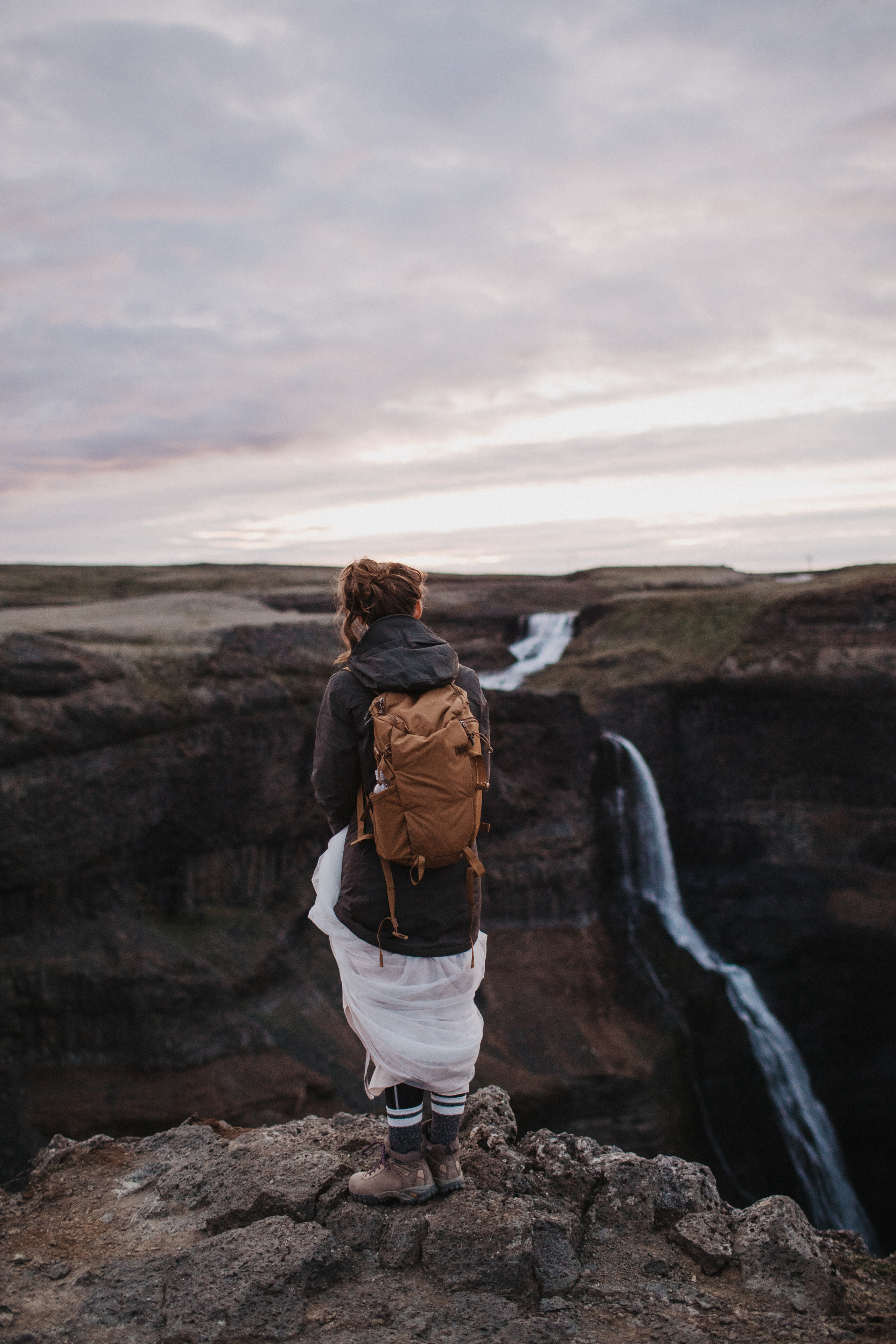 Midnight sun elopement at Haifoss in Iceland. Iceland elopement photographer & videographer