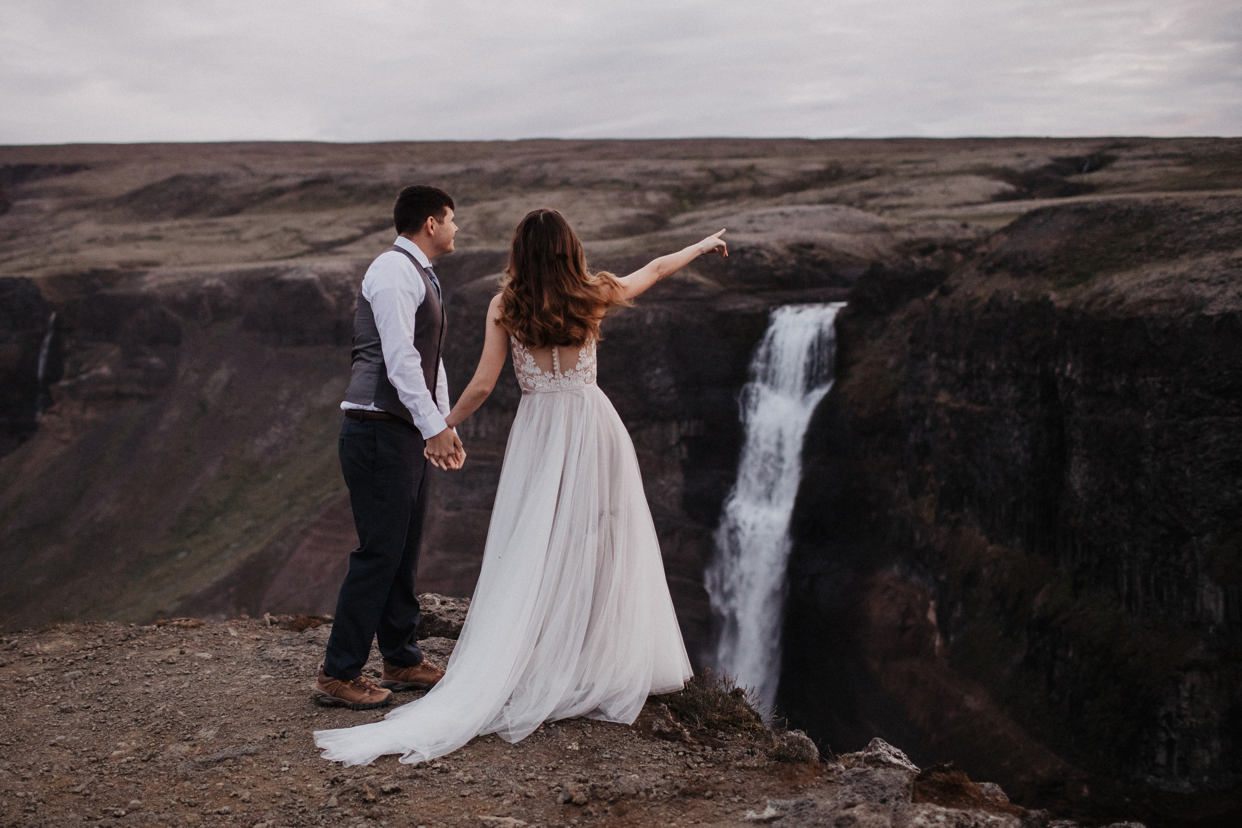 Midnight sun elopement at Haifoss in Iceland. Iceland elopement photographer & videographer