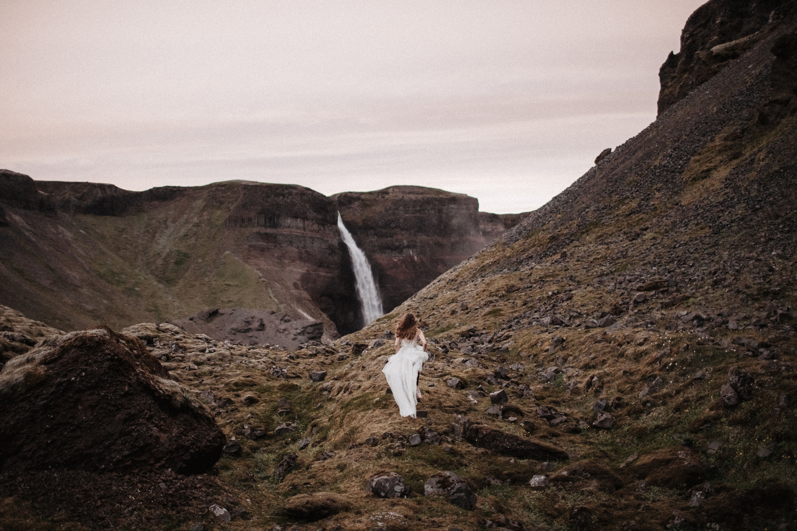 Midnight sun elopement at Haifoss in Iceland. Iceland elopement photographer & videographer