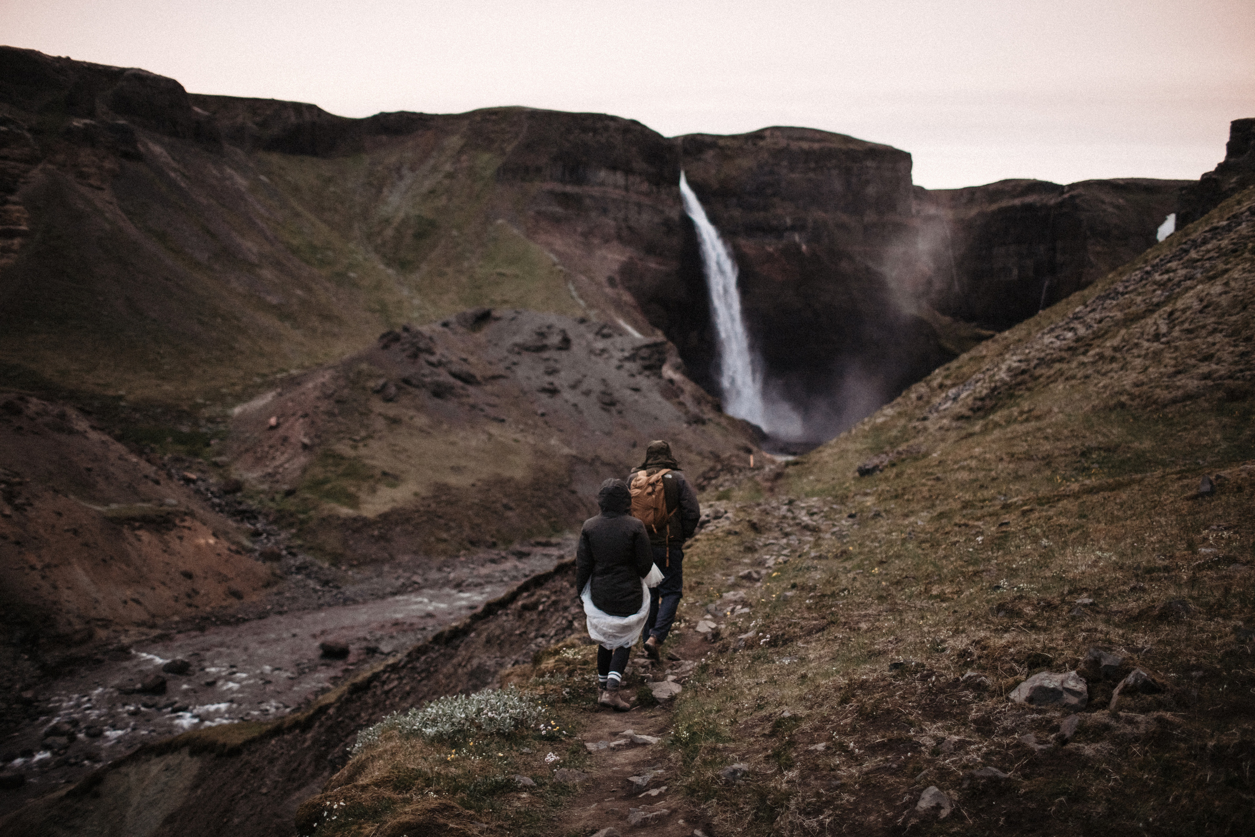 Midnight sun elopement at Haifoss in Iceland. Iceland elopement photographer & videographer