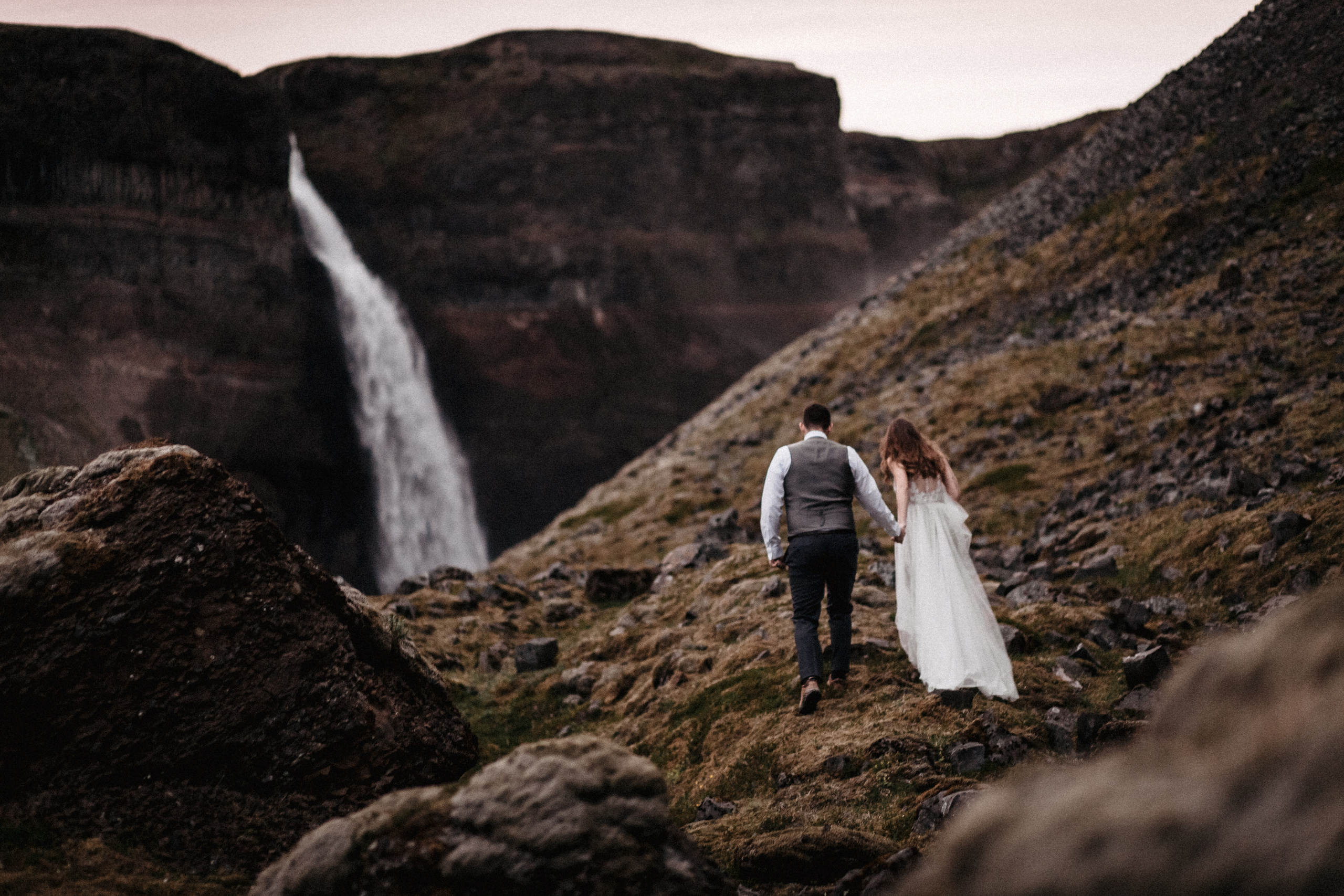 Midnight sun elopement at Haifoss in Iceland. Iceland elopement photographer & videographer