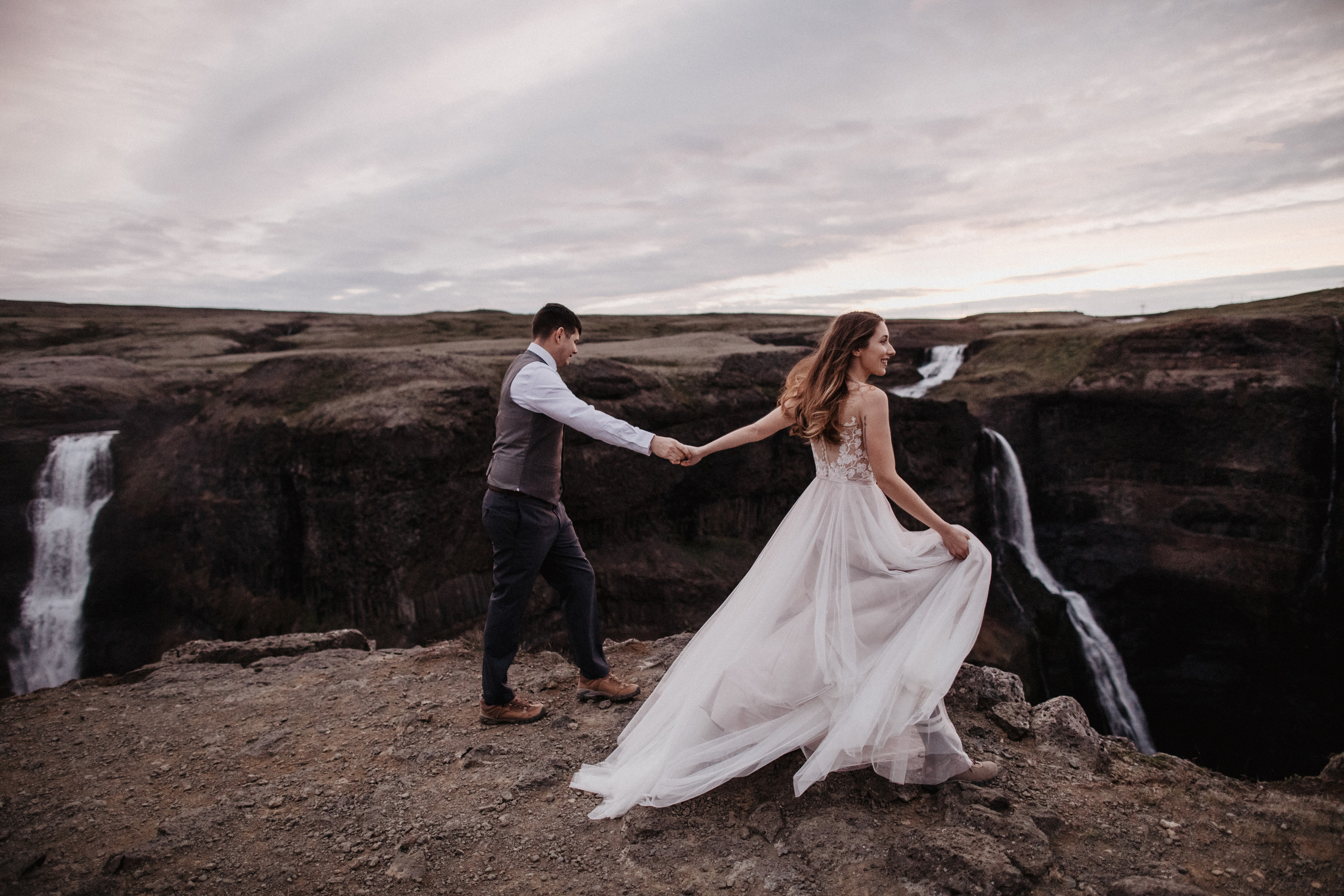 Midnight sun elopement at Haifoss in Iceland. Iceland elopement photographer & videographer