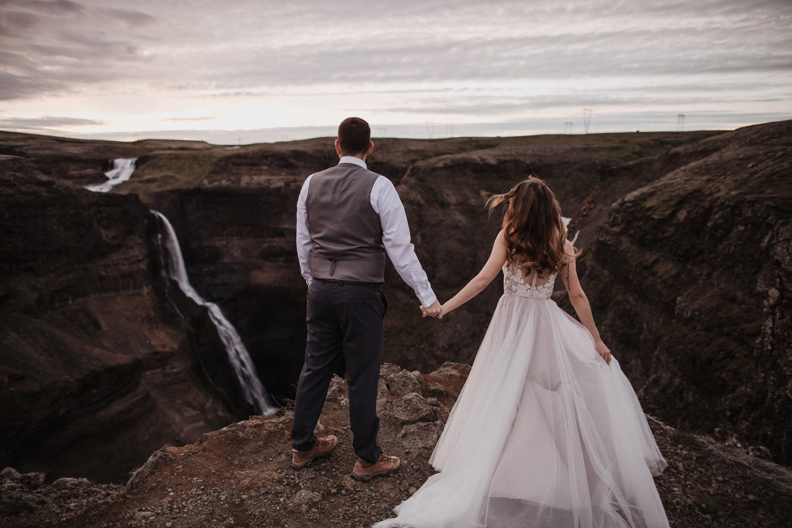 Midnight sun elopement at Haifoss in Iceland. Iceland elopement photographer & videographer