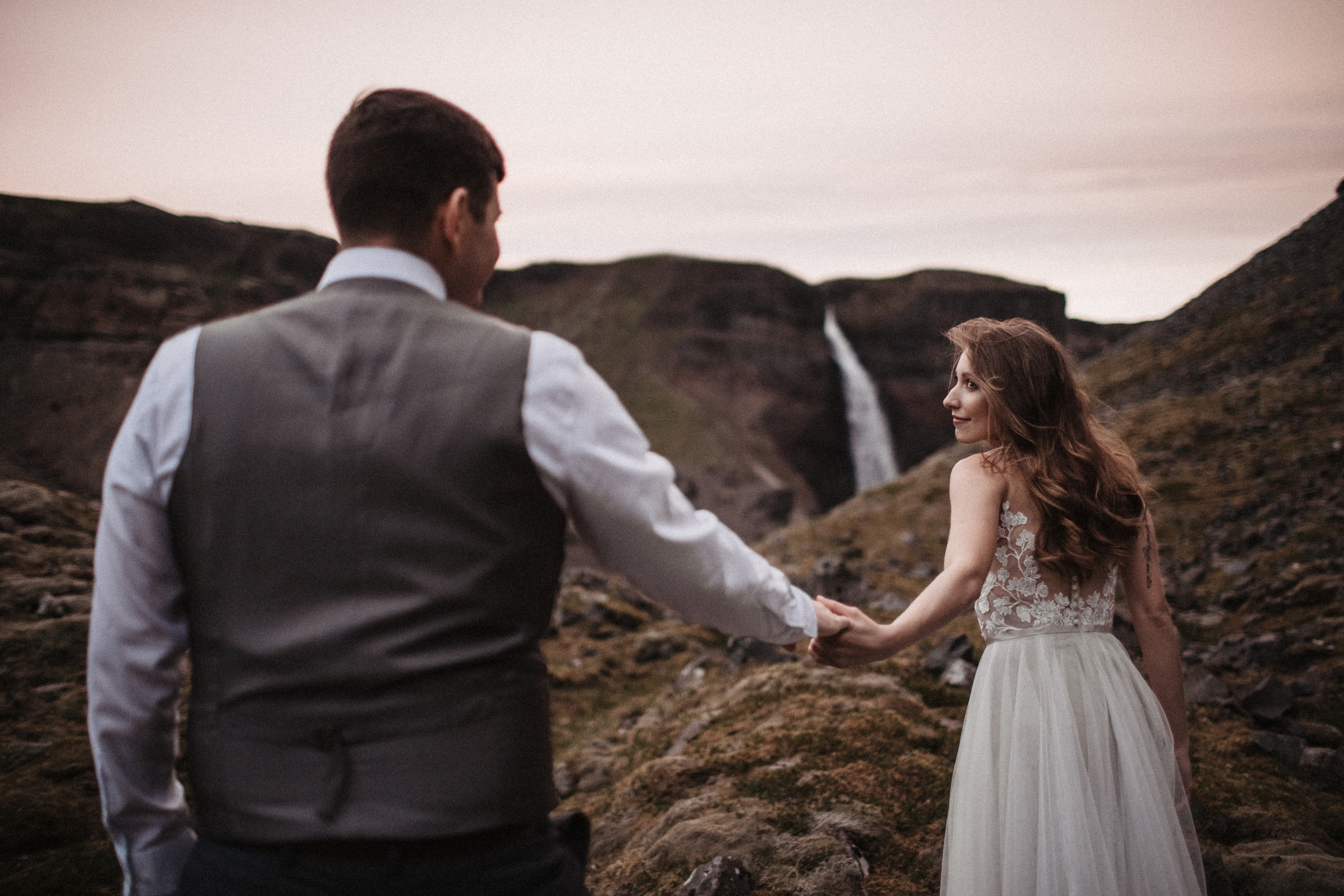Midnight sun elopement at Haifoss in Iceland. Iceland elopement photographer & videographer