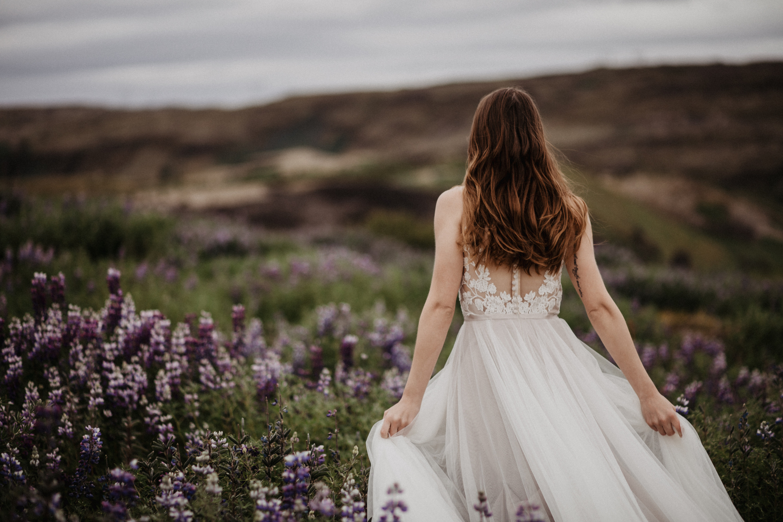 Midnight sun elopement at Haifoss in Iceland. Iceland elopement photographer & videographer