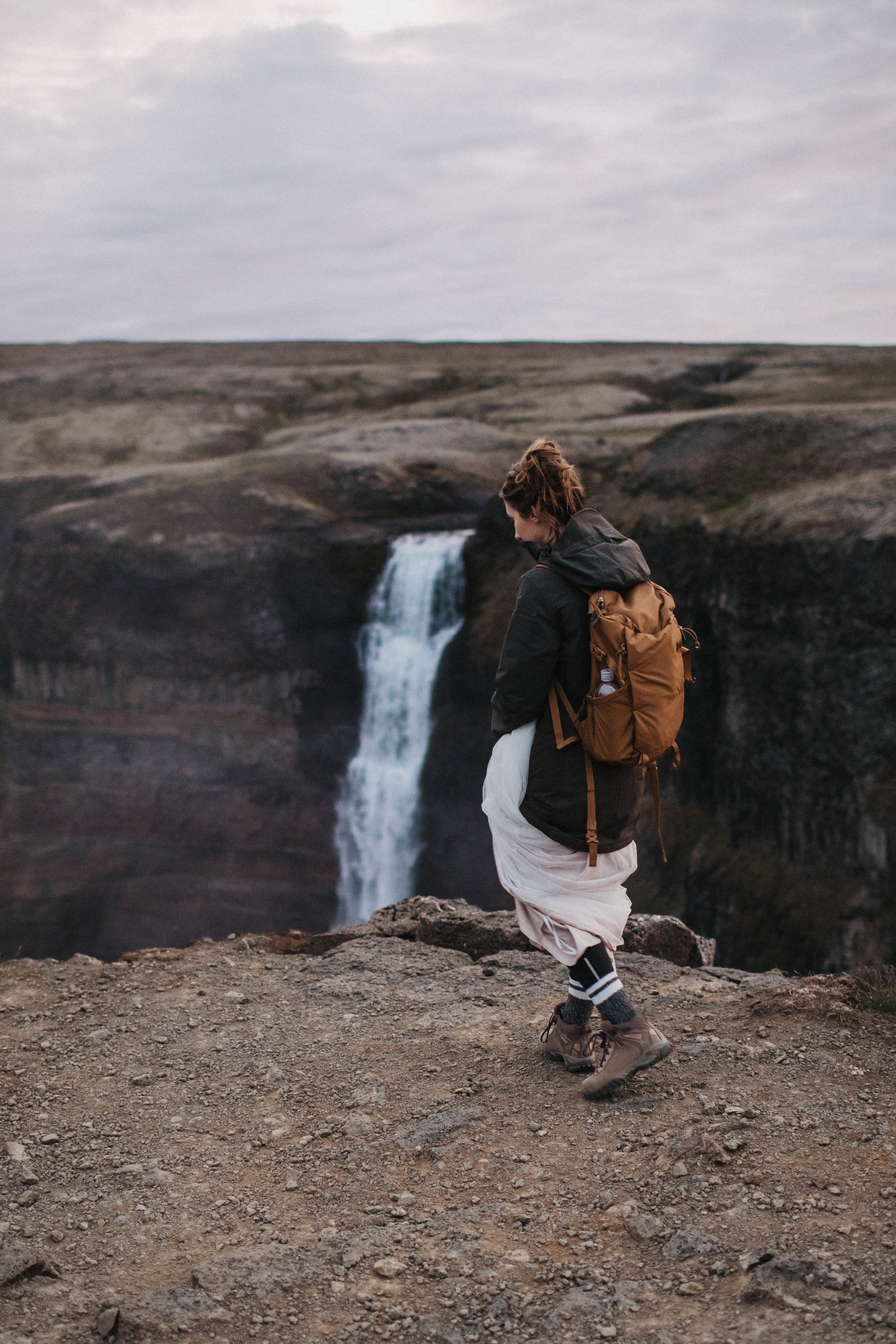 Midnight sun elopement at Haifoss in Iceland. Iceland elopement photographer & videographer