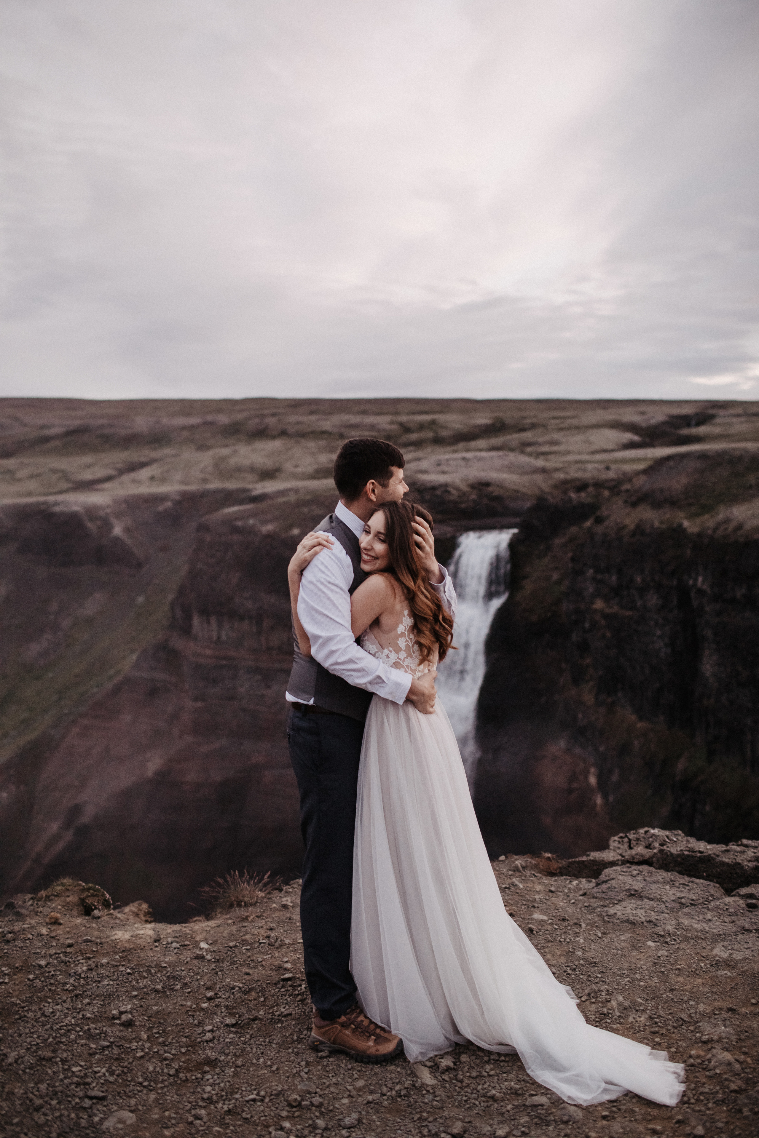 Midnight sun elopement at Haifoss in Iceland. Iceland elopement photographer & videographer