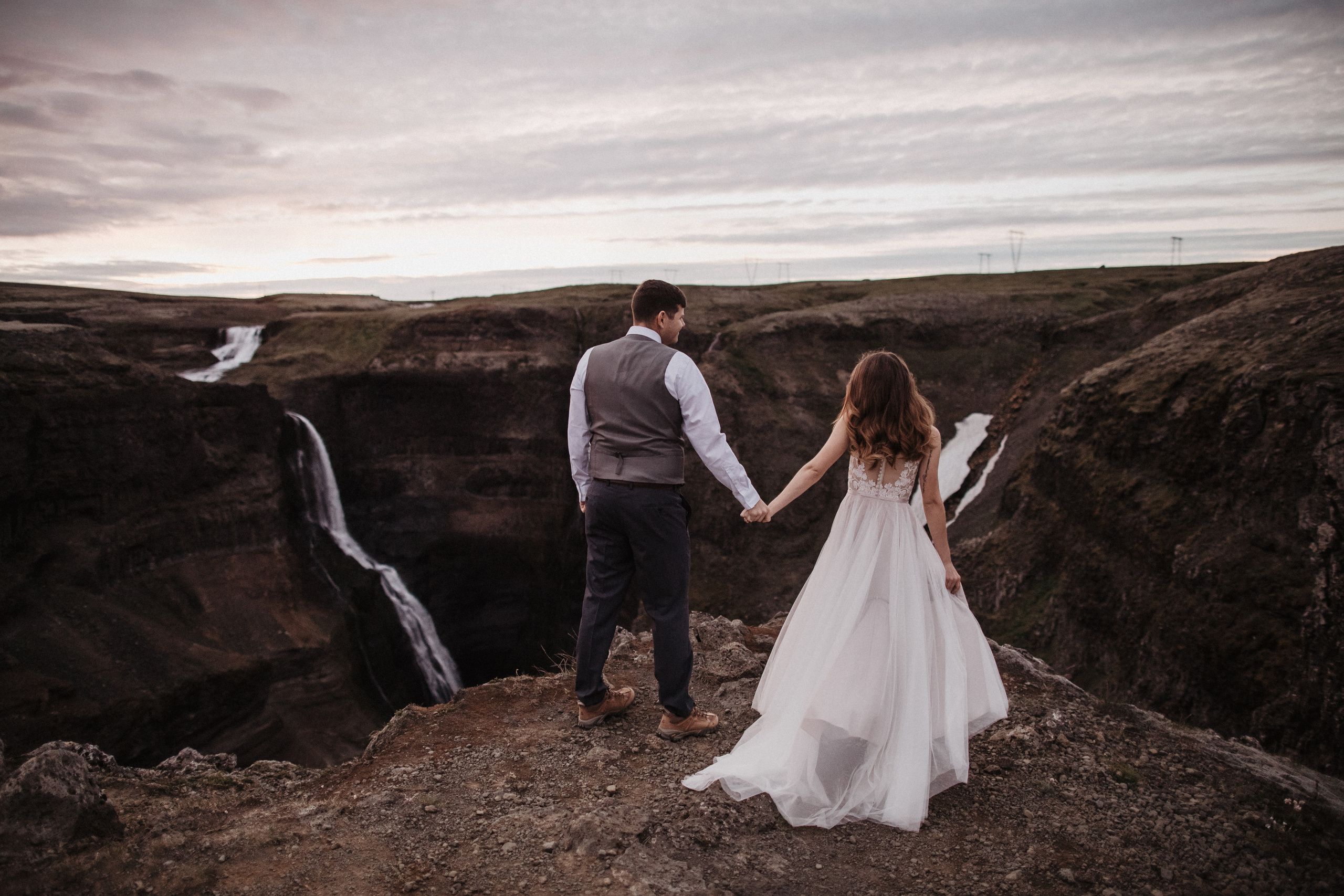 Midnight sun elopement at Haifoss in Iceland. Iceland elopement photographer & videographer