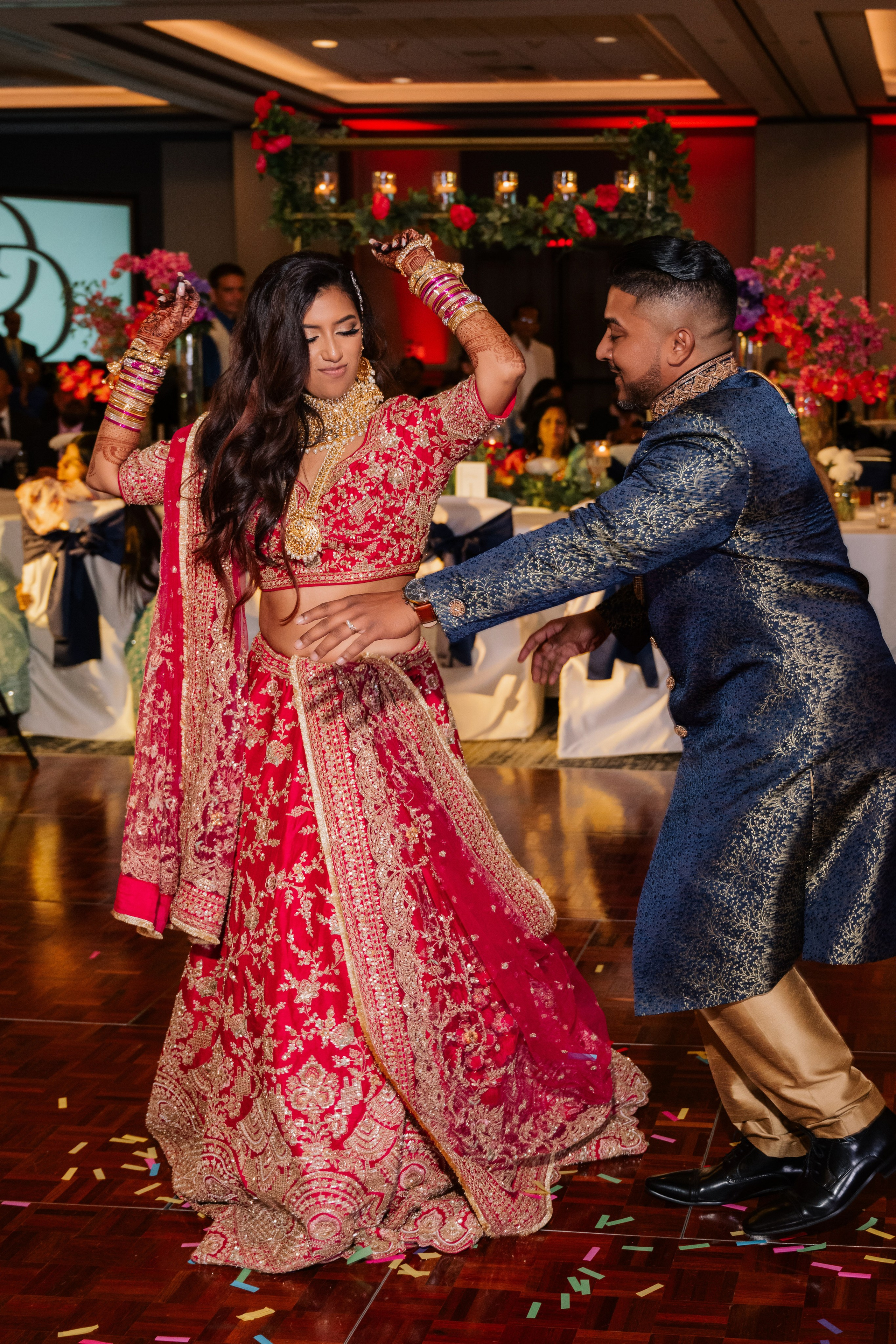 a man and woman dancing on a dance floor