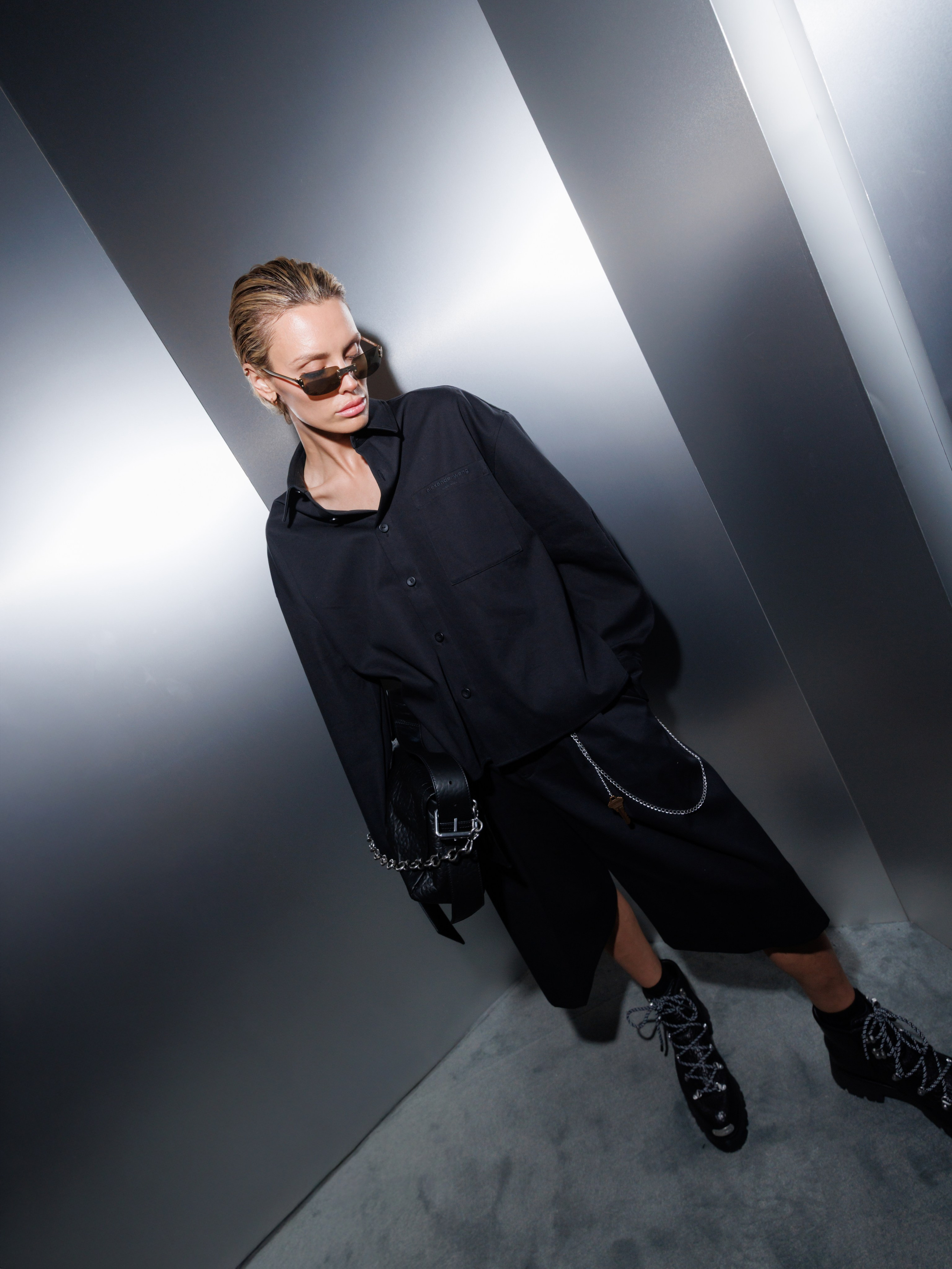 Model in black futuristic outfit – high-fashion NYC runway