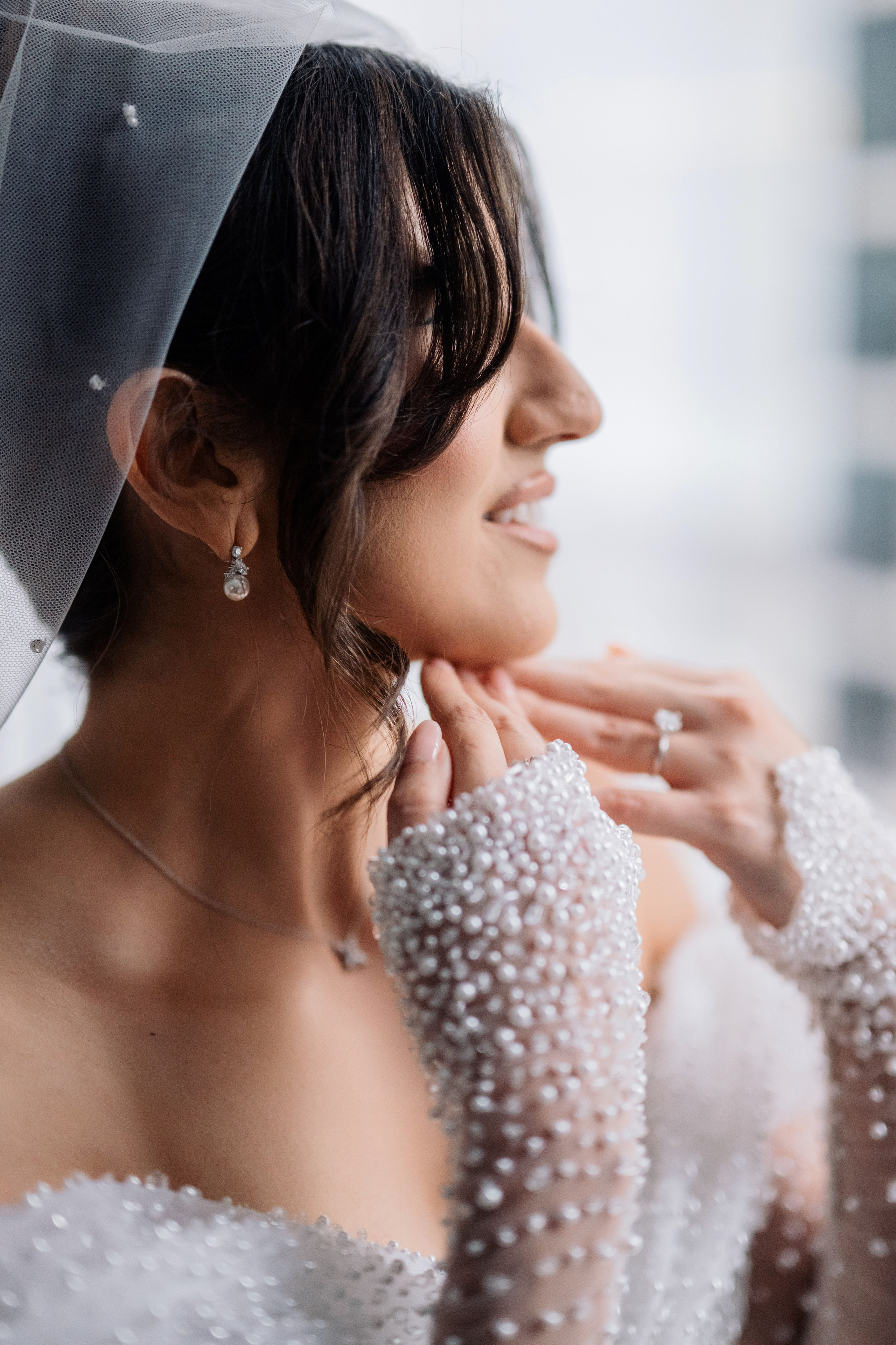 a bride wearing a veil and veillet
