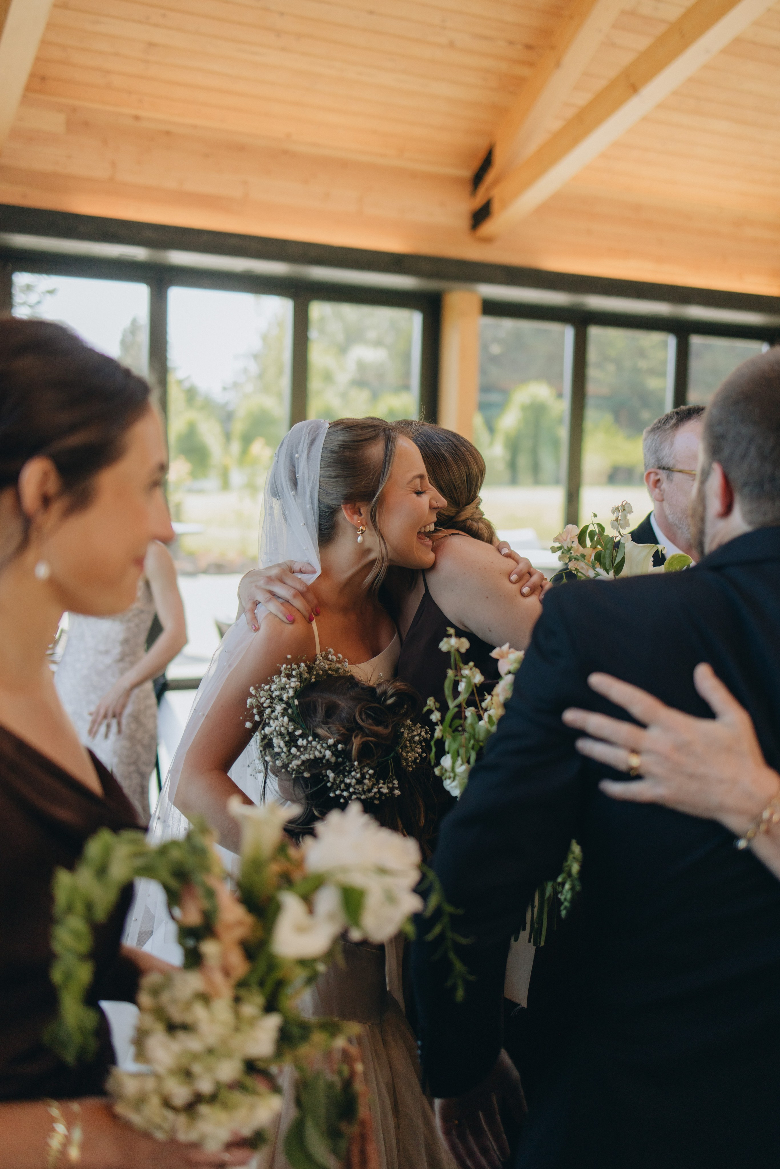 Candid guest moments during a Wind Mountain Ranch wedding