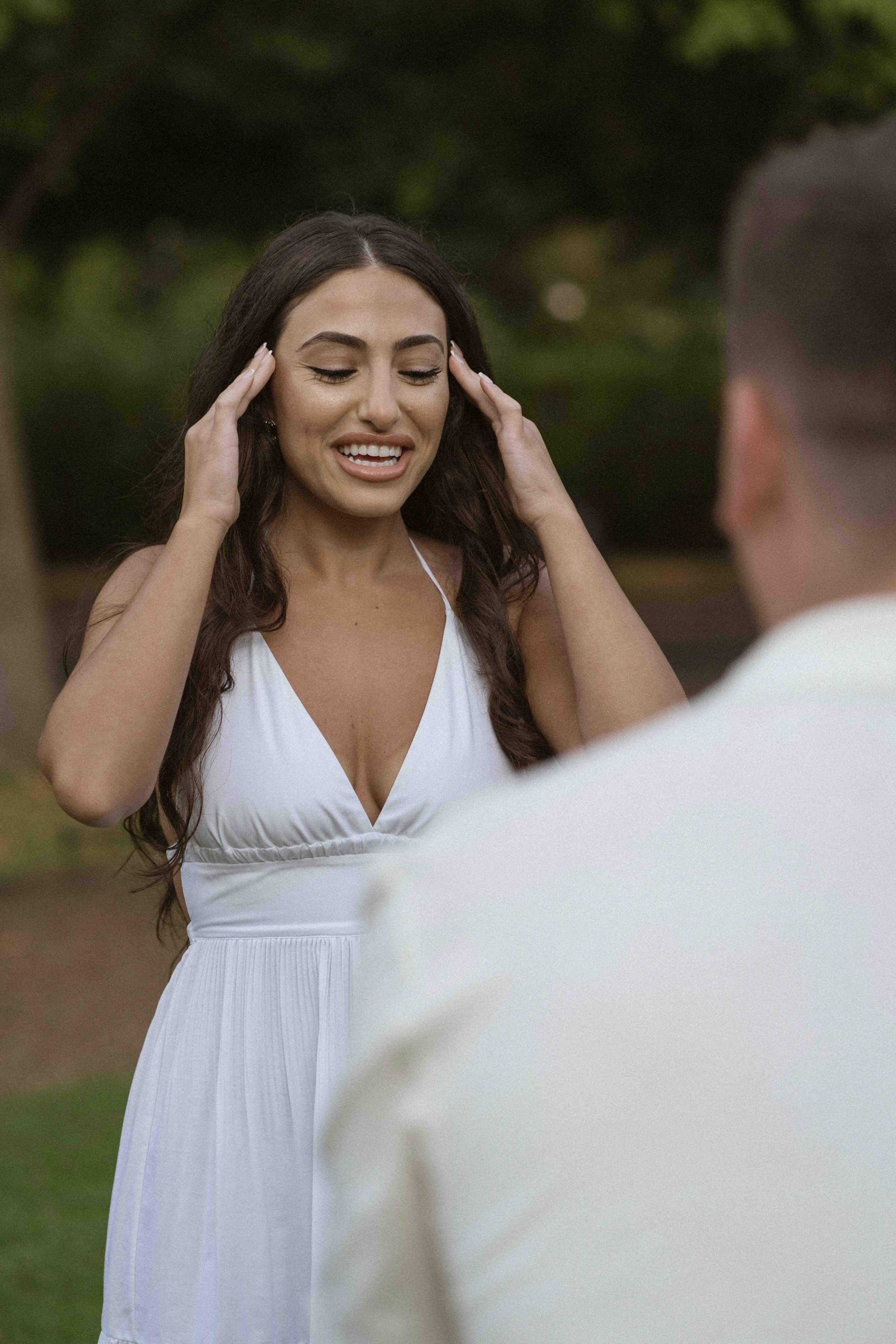 Emotional reaction during proposal in Regent’s Park London, candid engagement photography