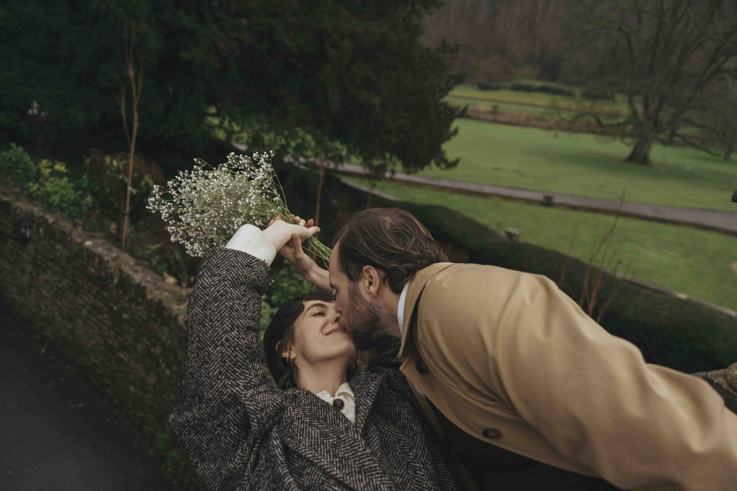 Rainy Engagement Photoshoot in Castle Combe, Cotswolds | Cinematic Love Story. London Wedding Photographer | Engagement & Proposal Photography by Natasha Ferreira