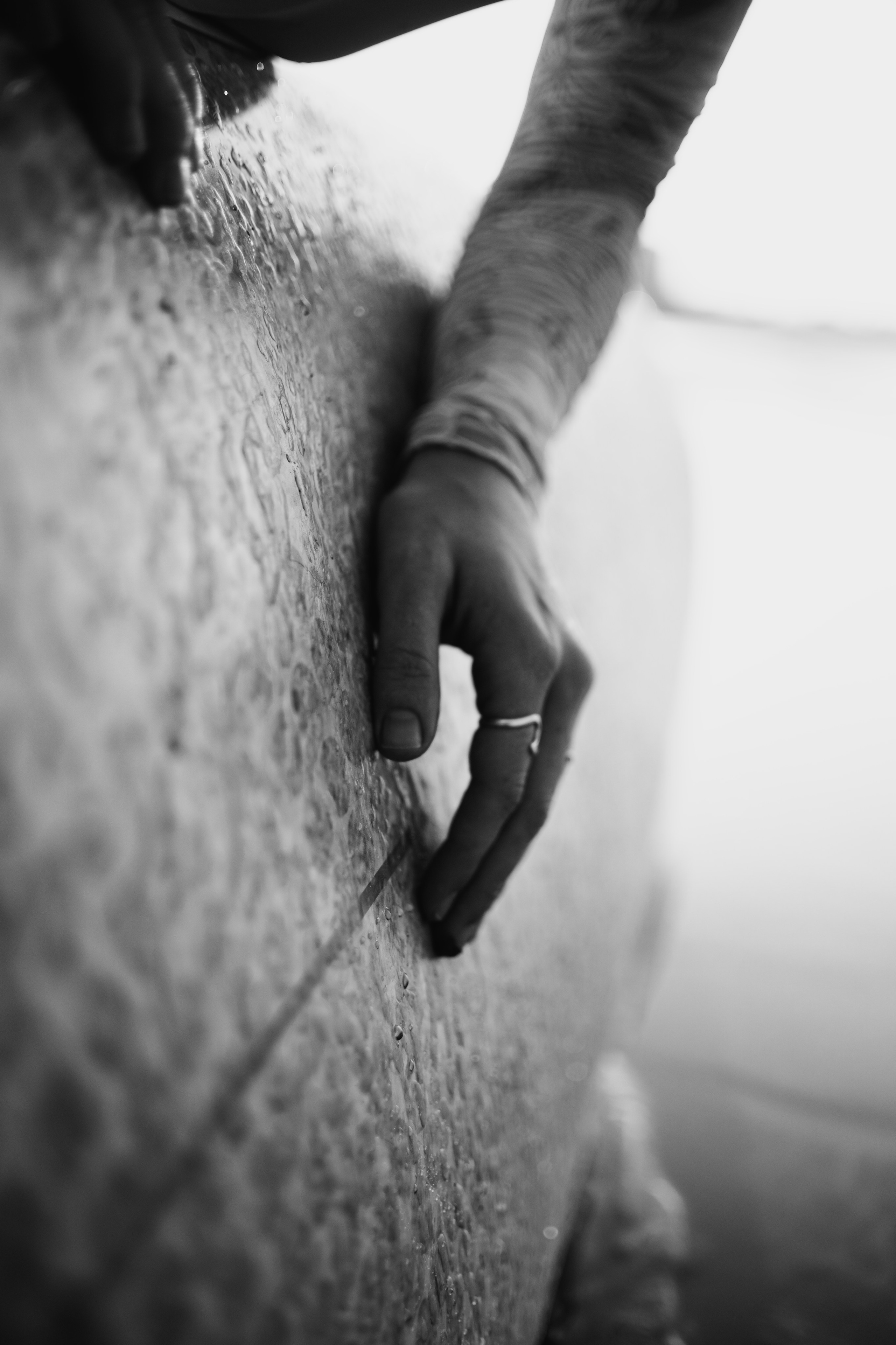 Photoshoot with a surfboard | BW