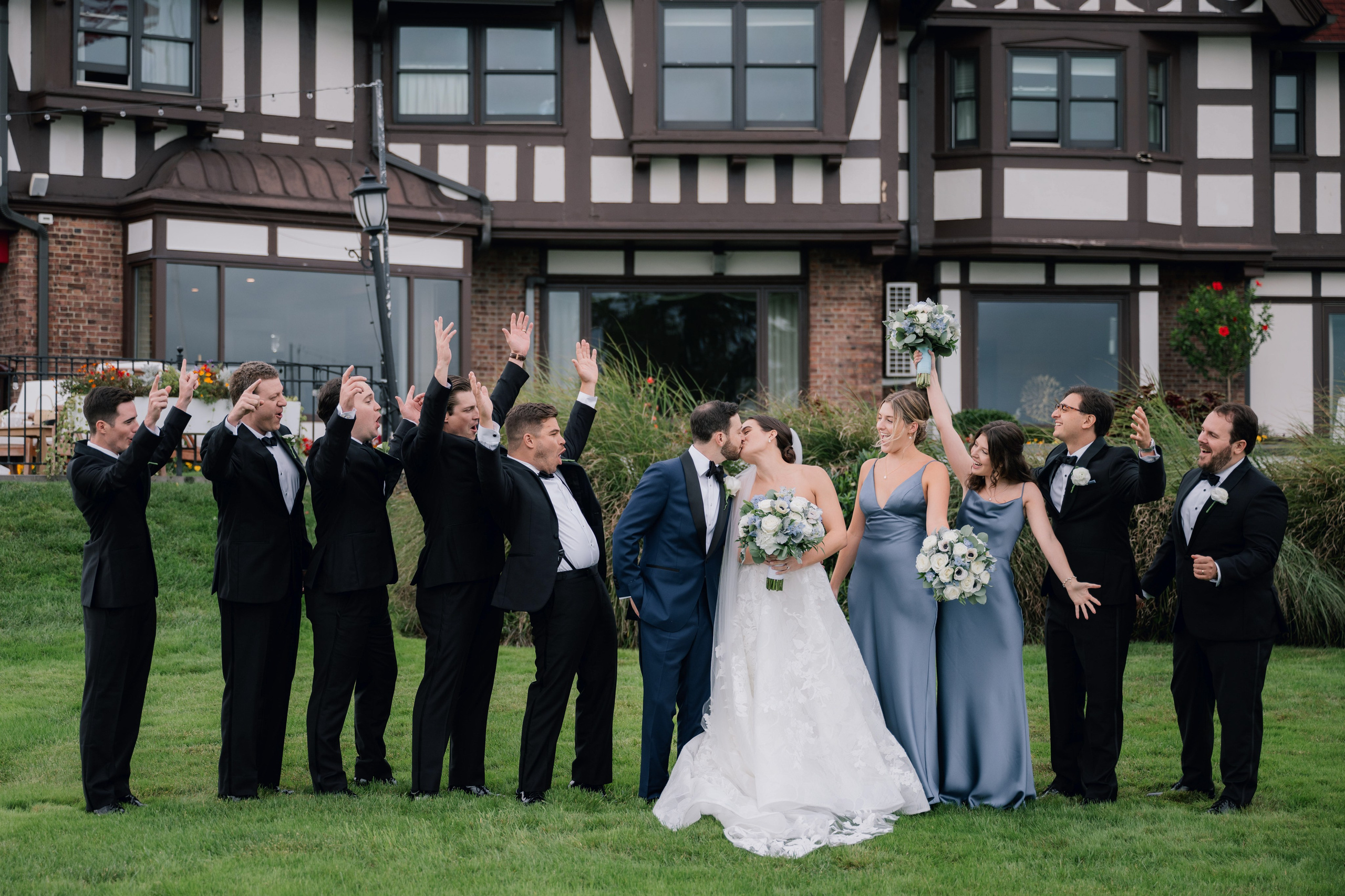 a group of people standing in front of a building