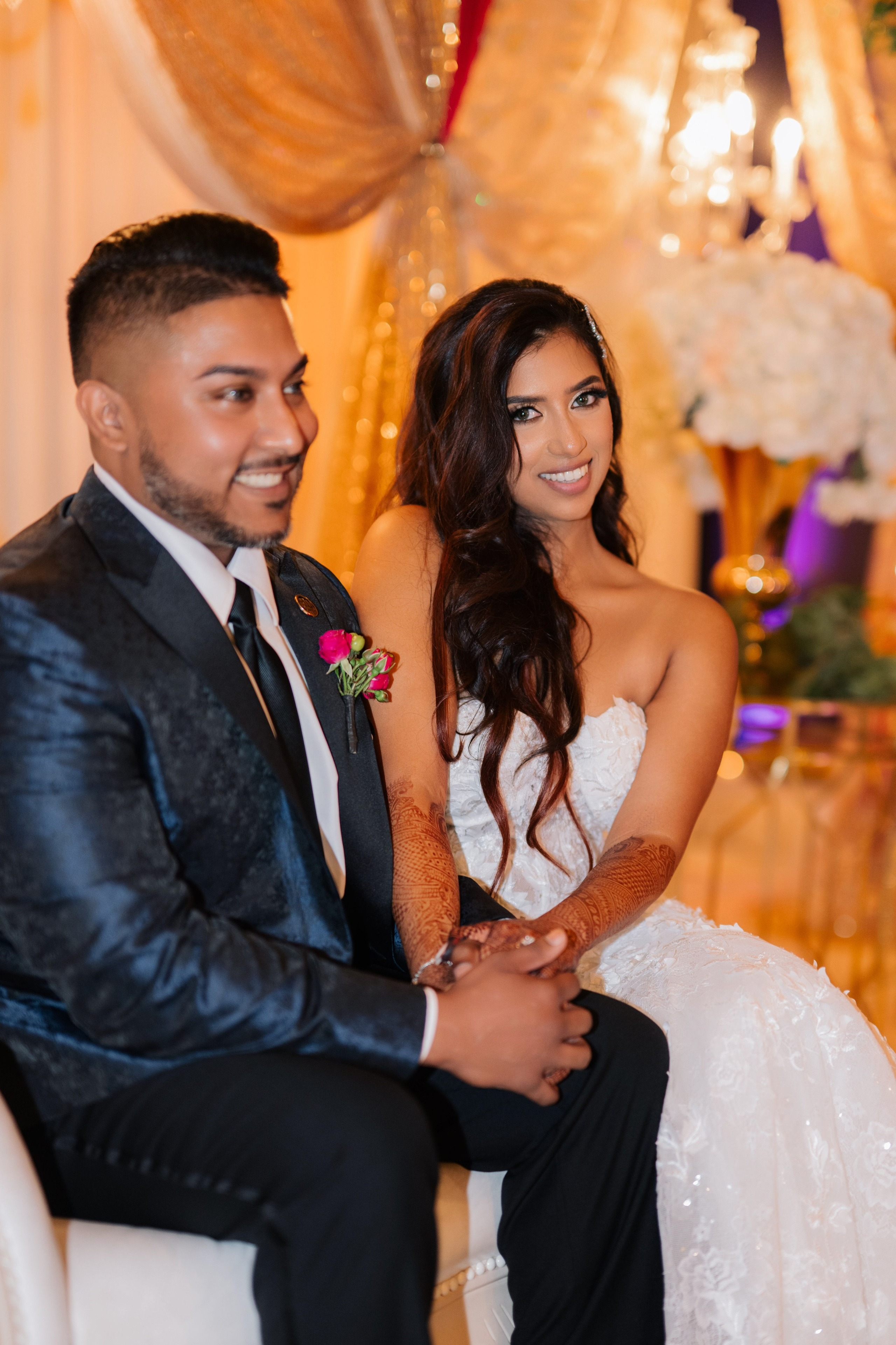 a man and woman sitting on a couch