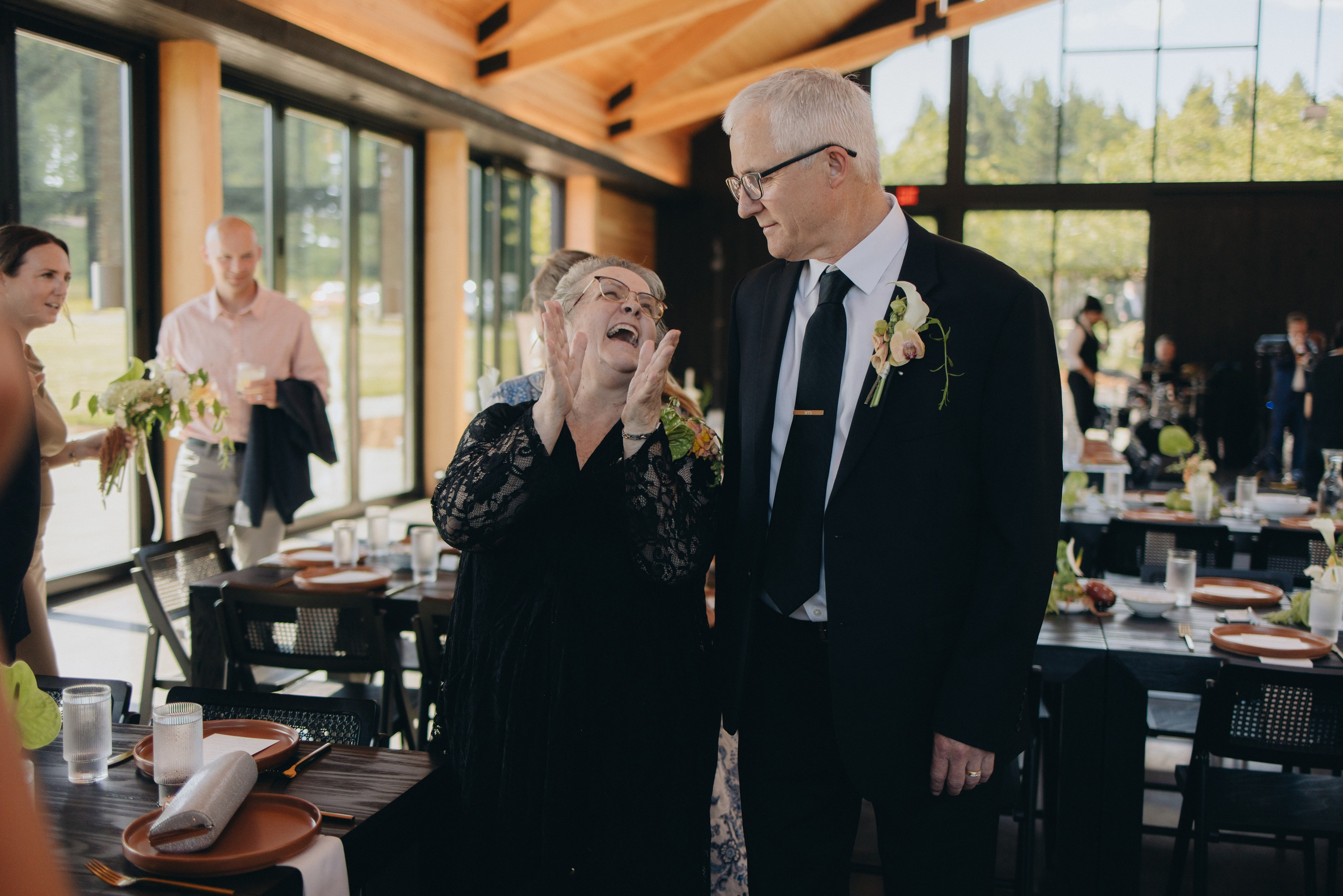Candid guest moments during a Wind Mountain Ranch wedding