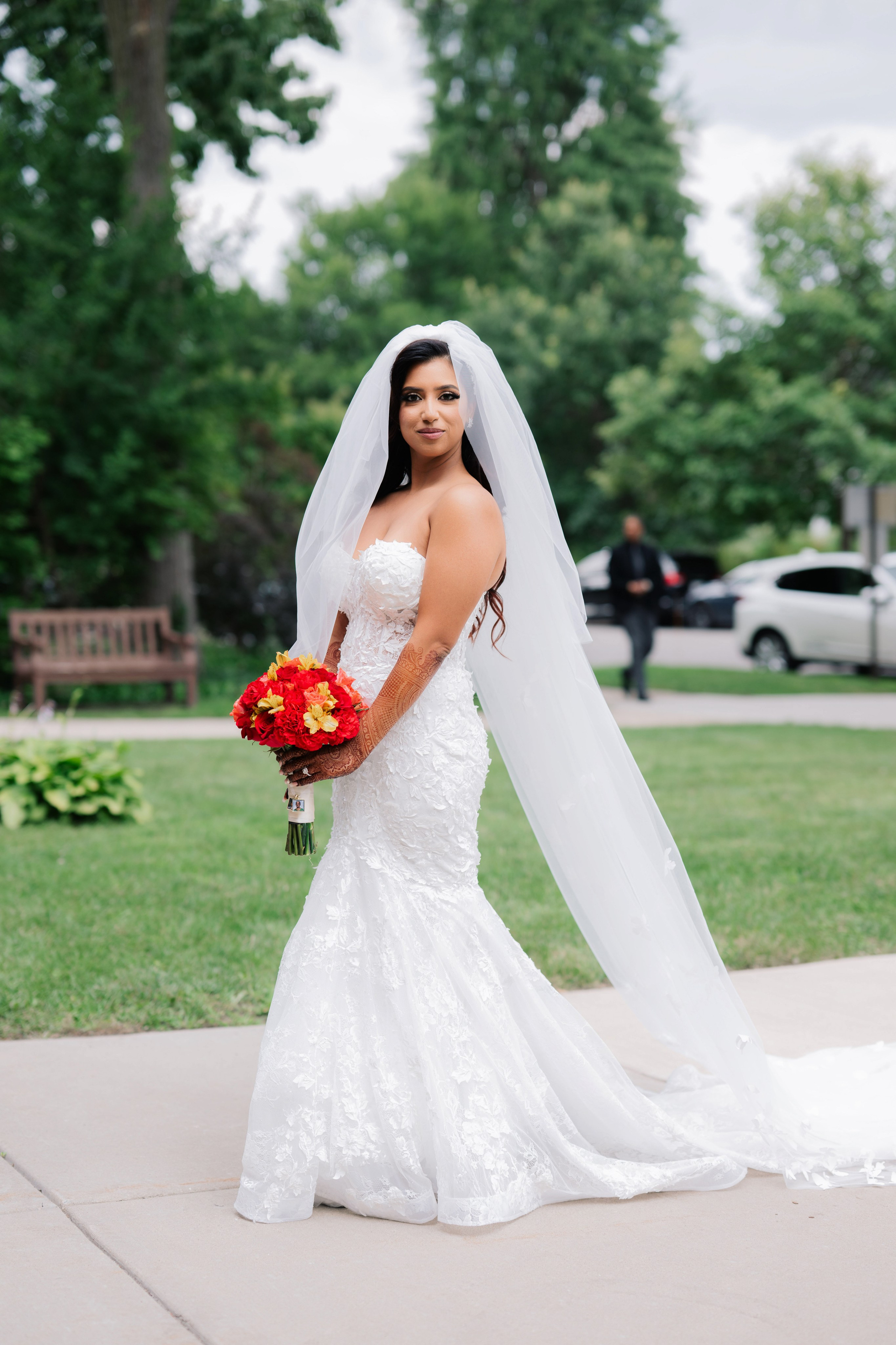 a bride in a wedding dress and veil
