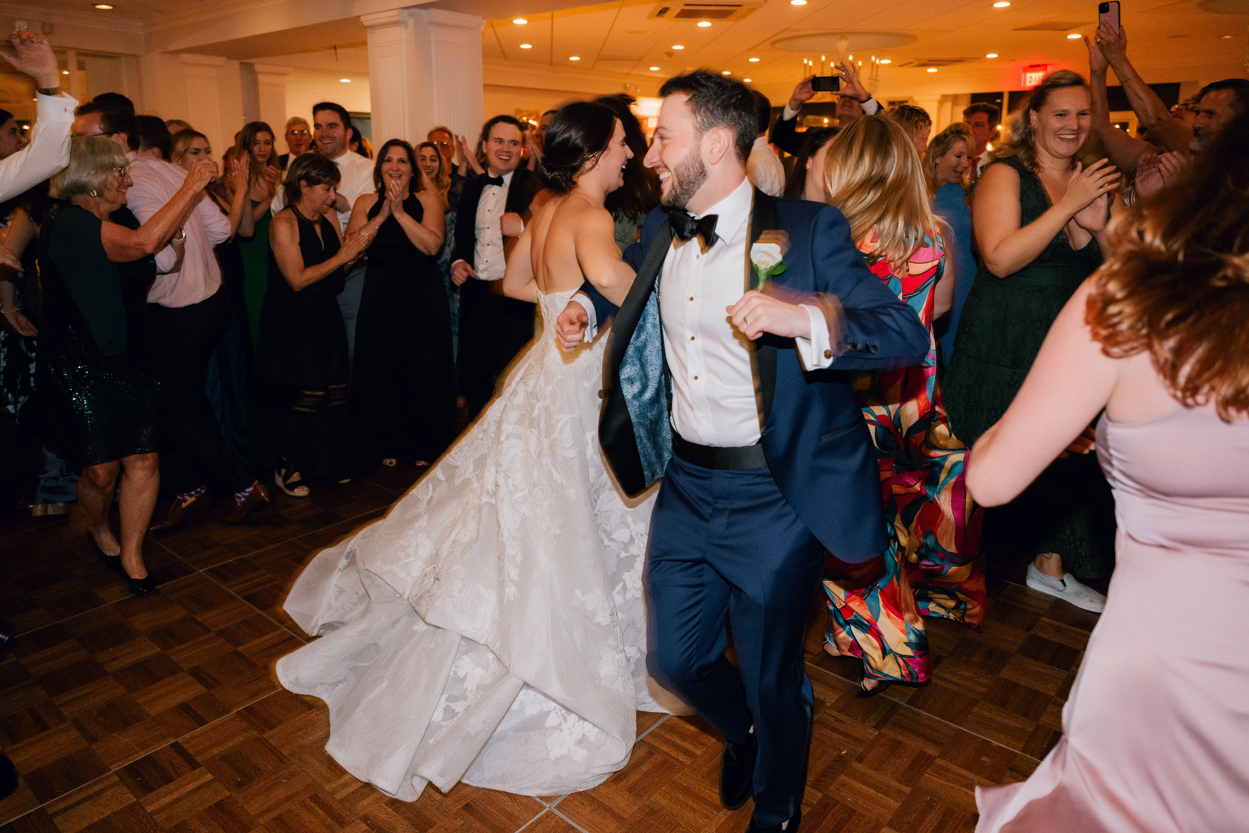 a bride and groom dancing