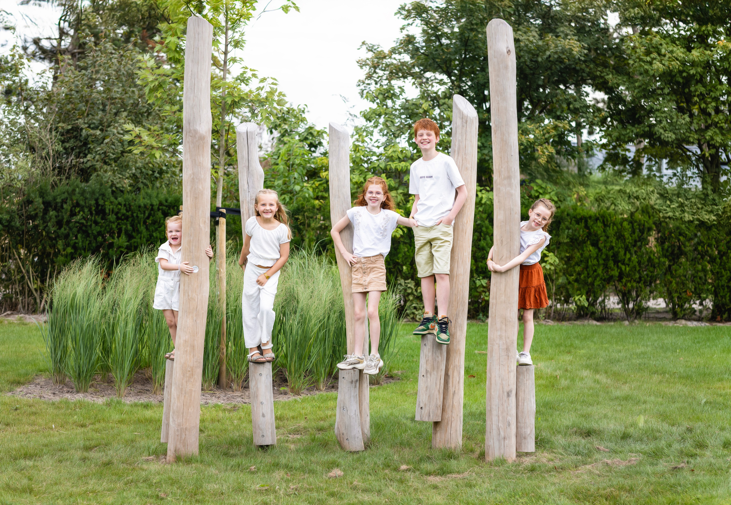 Gezinsfotoshoot van broers en zussen.