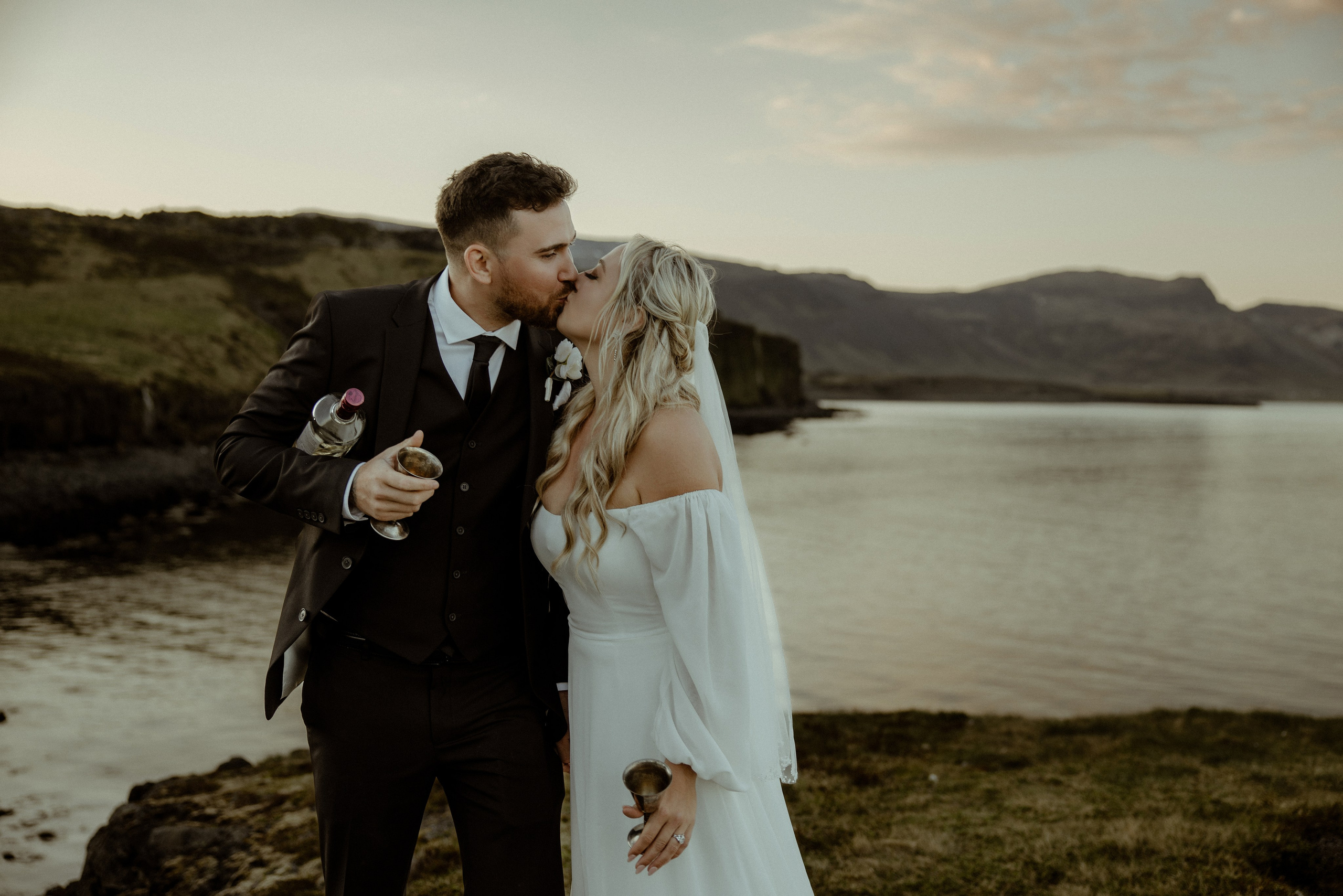 Iceland elopement at Budir with midnight sun wedding photos at black sand beach. Iceland elopement photographer & videographer
