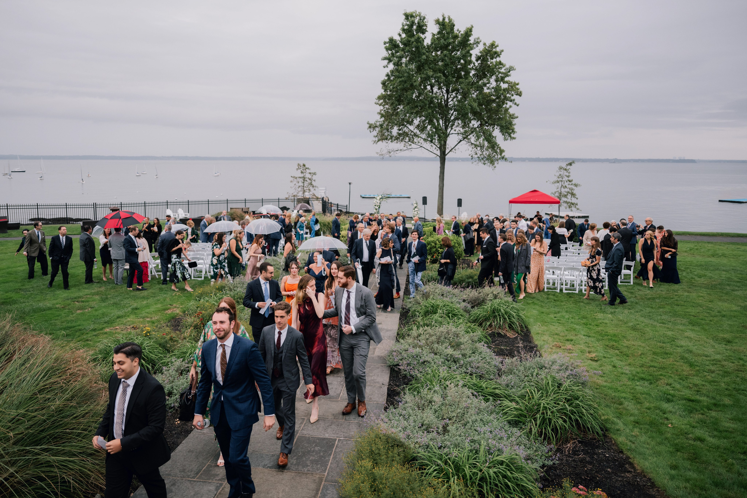 a group of people walking down a path