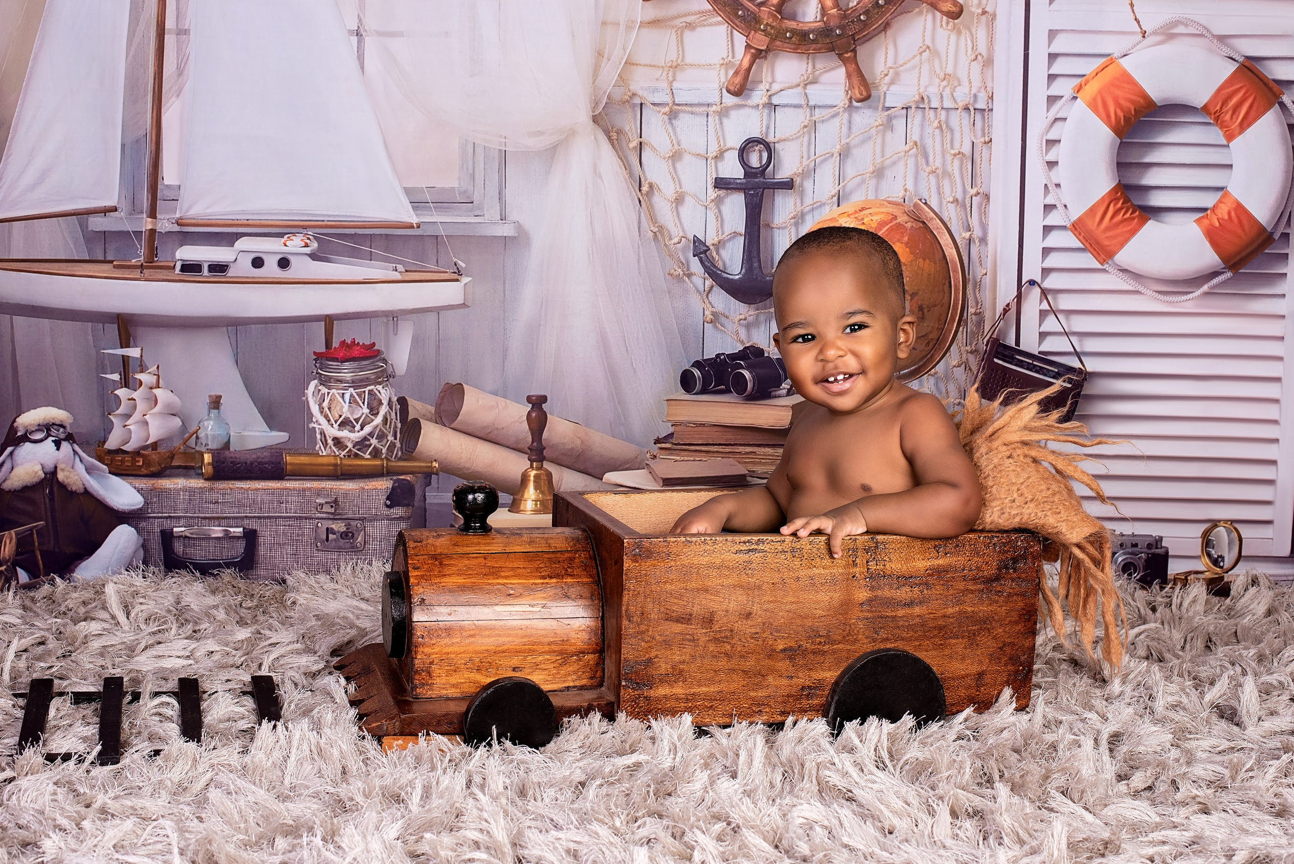 1 year African baby boy photo shoot in the wooden train Nairobi Kenya