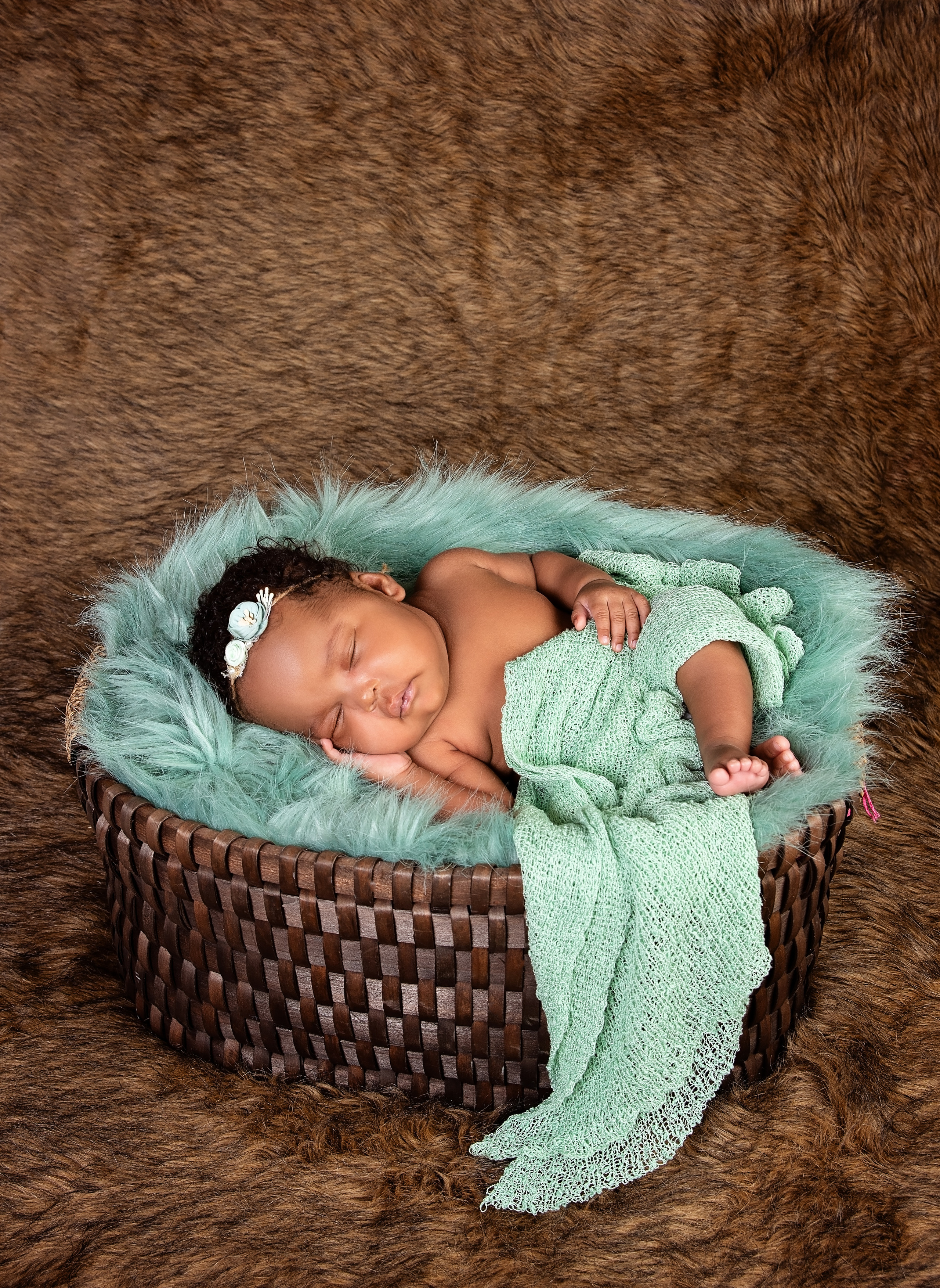 African newborn 2 months baby laying basket photo Mombasa Kenya