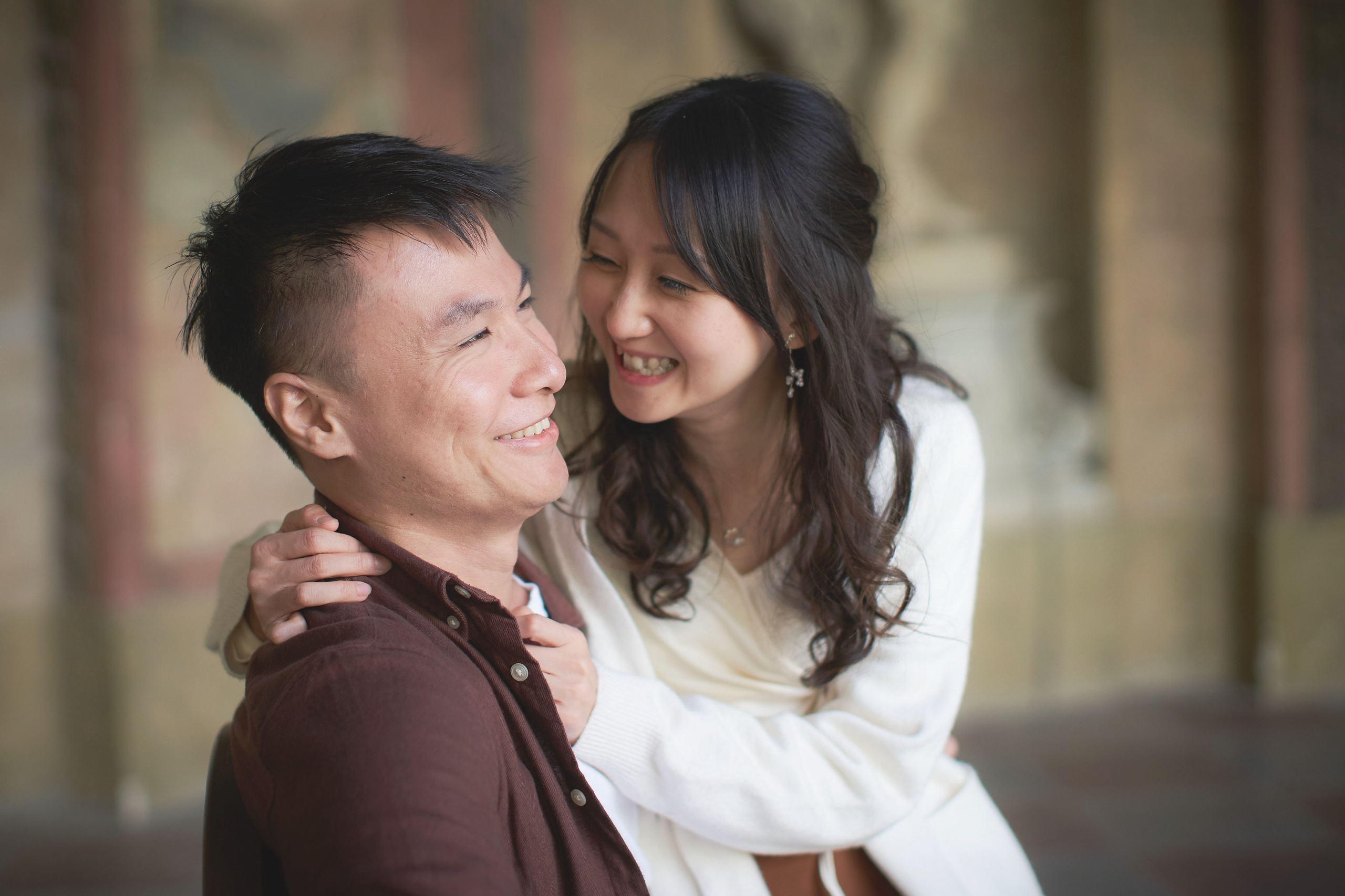 Eva playfully coaxing smile from Conan in fresco-lined Sala Terrena, Vrtba Garden.