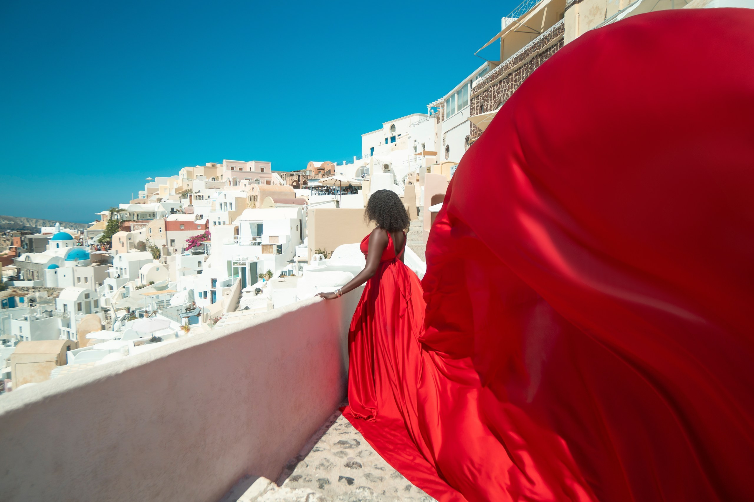 Red Flying Dress Santorini. Photographer in Santorini SokoLOVE Alex| Flying Dress Santorini