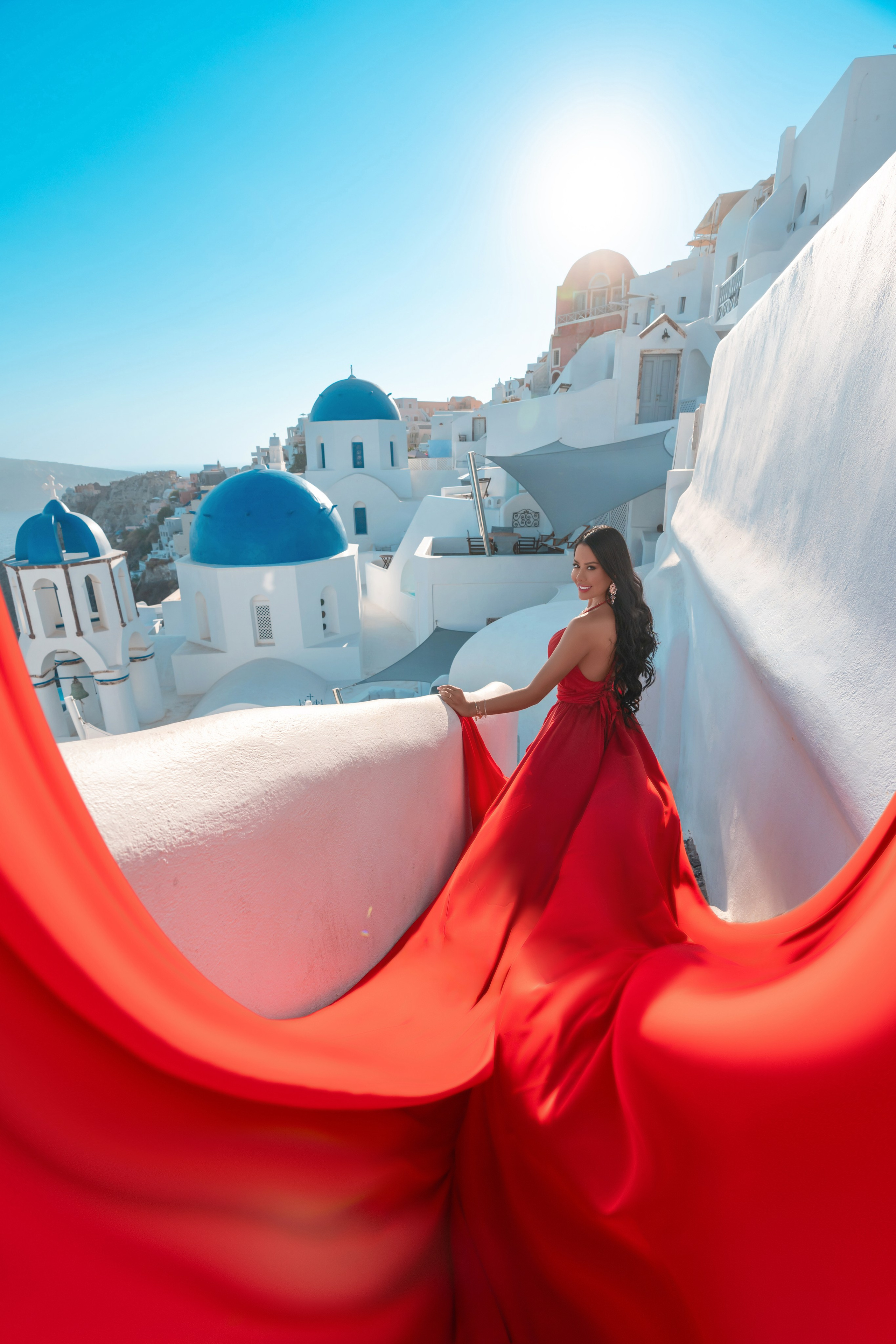 Nathalie Sossa in a flying dress Santorini photoshooting by SokoLOVE