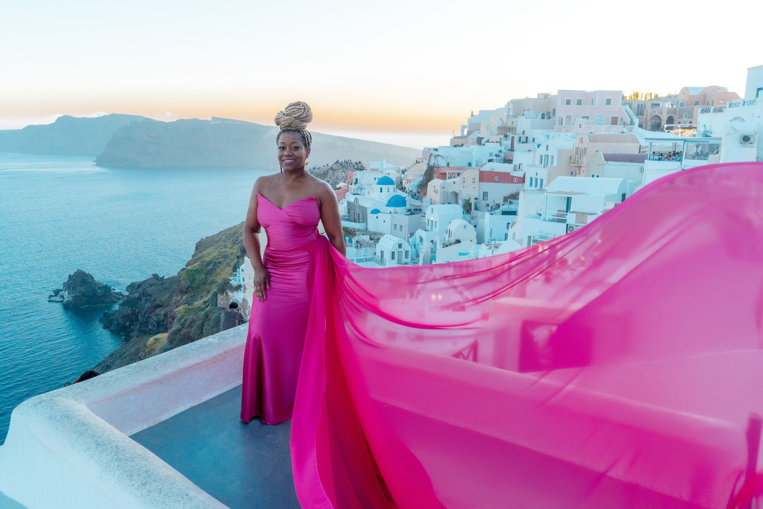 Group photoshoot in flying dress in Oia. Photographer in Santorini SokoLOVE Alex| Flying Dress Santorini
