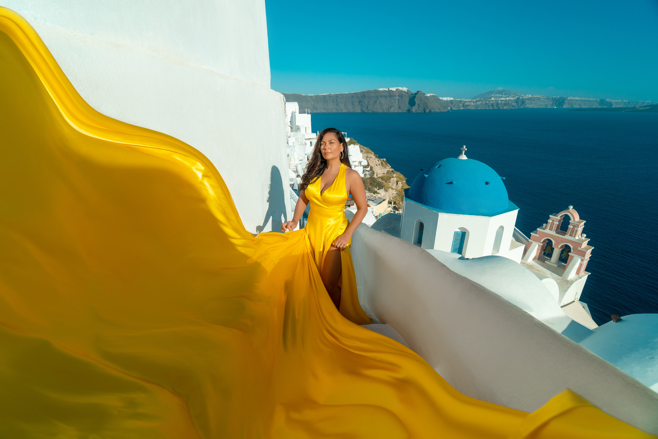 Group photoshoot in flying dress in Oia. Photographer in Santorini SokoLOVE Alex| Flying Dress Santorini