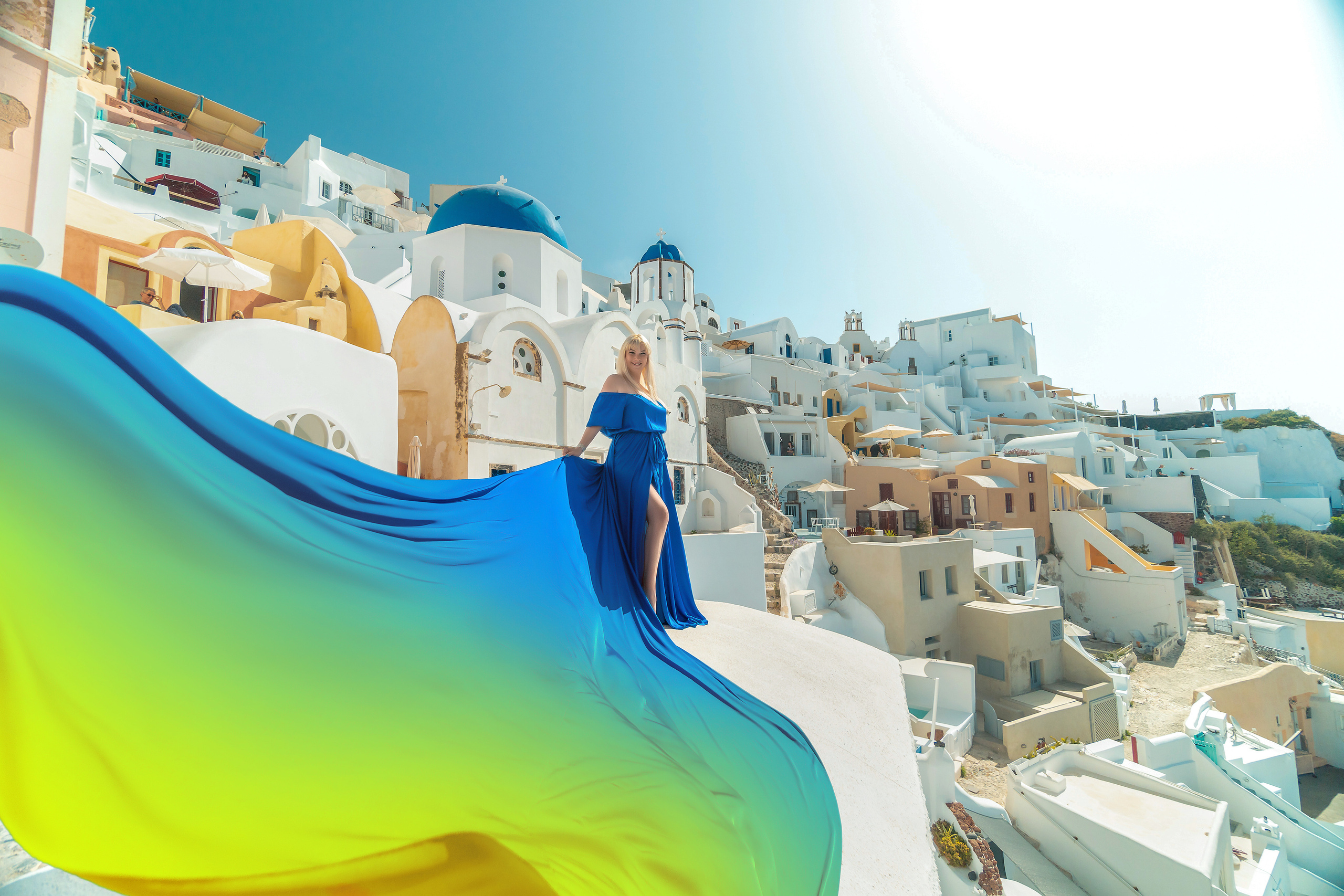Photo session in Oia, Santorini in the morning. Photographer in Santorini SokoLOVE Alex| Flying Dress Santorini