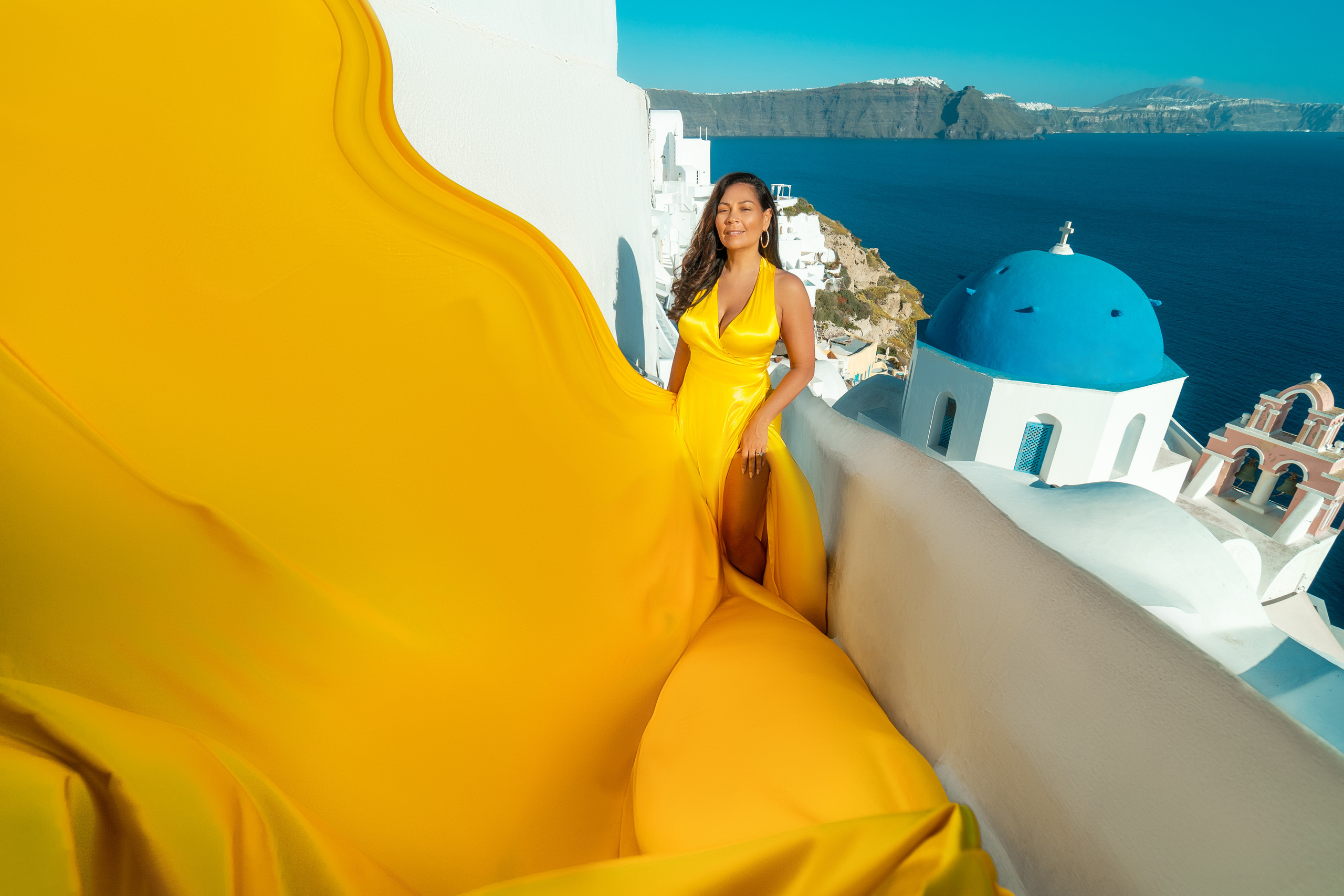 Group photoshoot in flying dress in Oia. Photographer in Santorini SokoLOVE Alex| Flying Dress Santorini