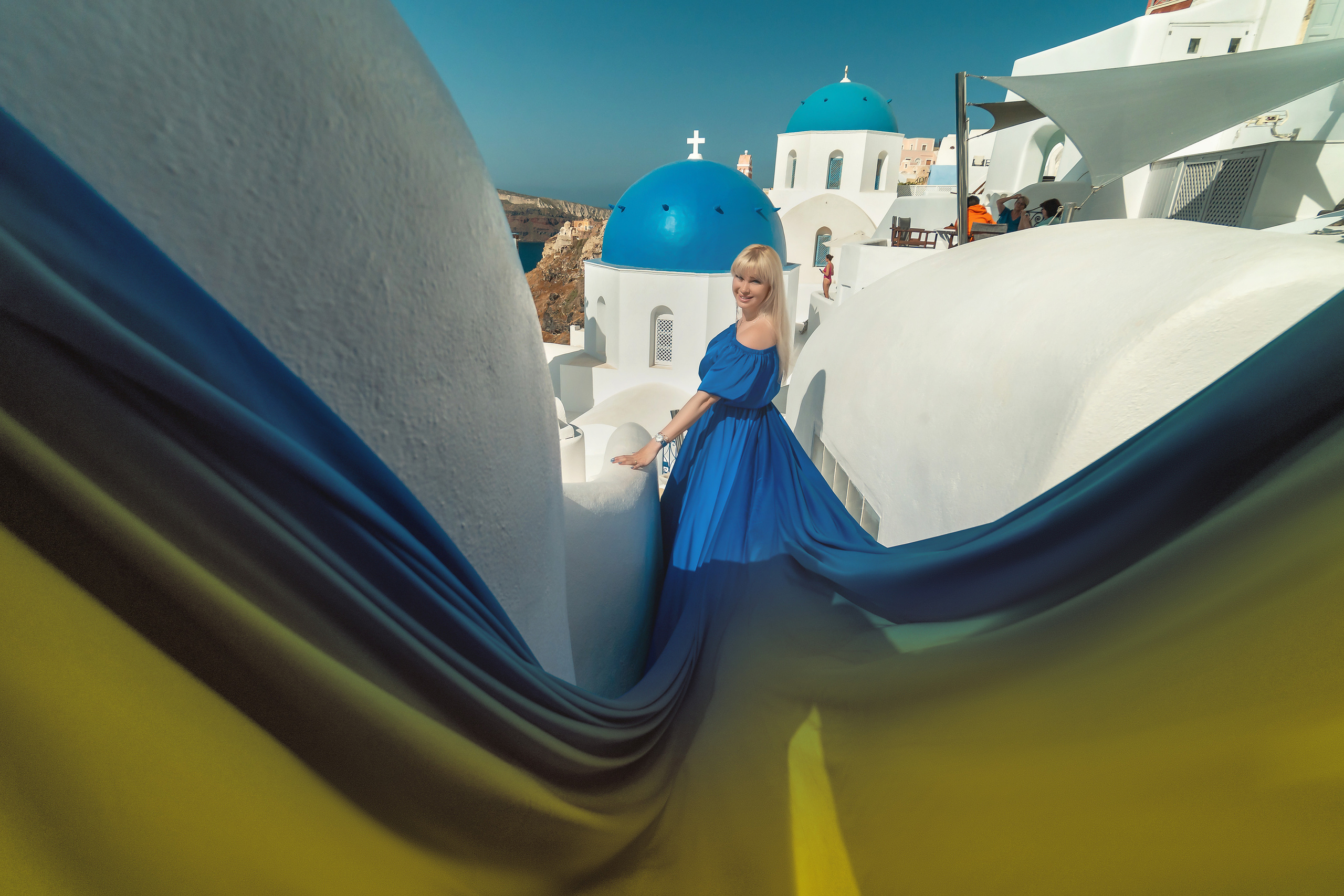 Photo session in Oia, Santorini in the morning. Photographer in Santorini SokoLOVE Alex| Flying Dress Santorini
