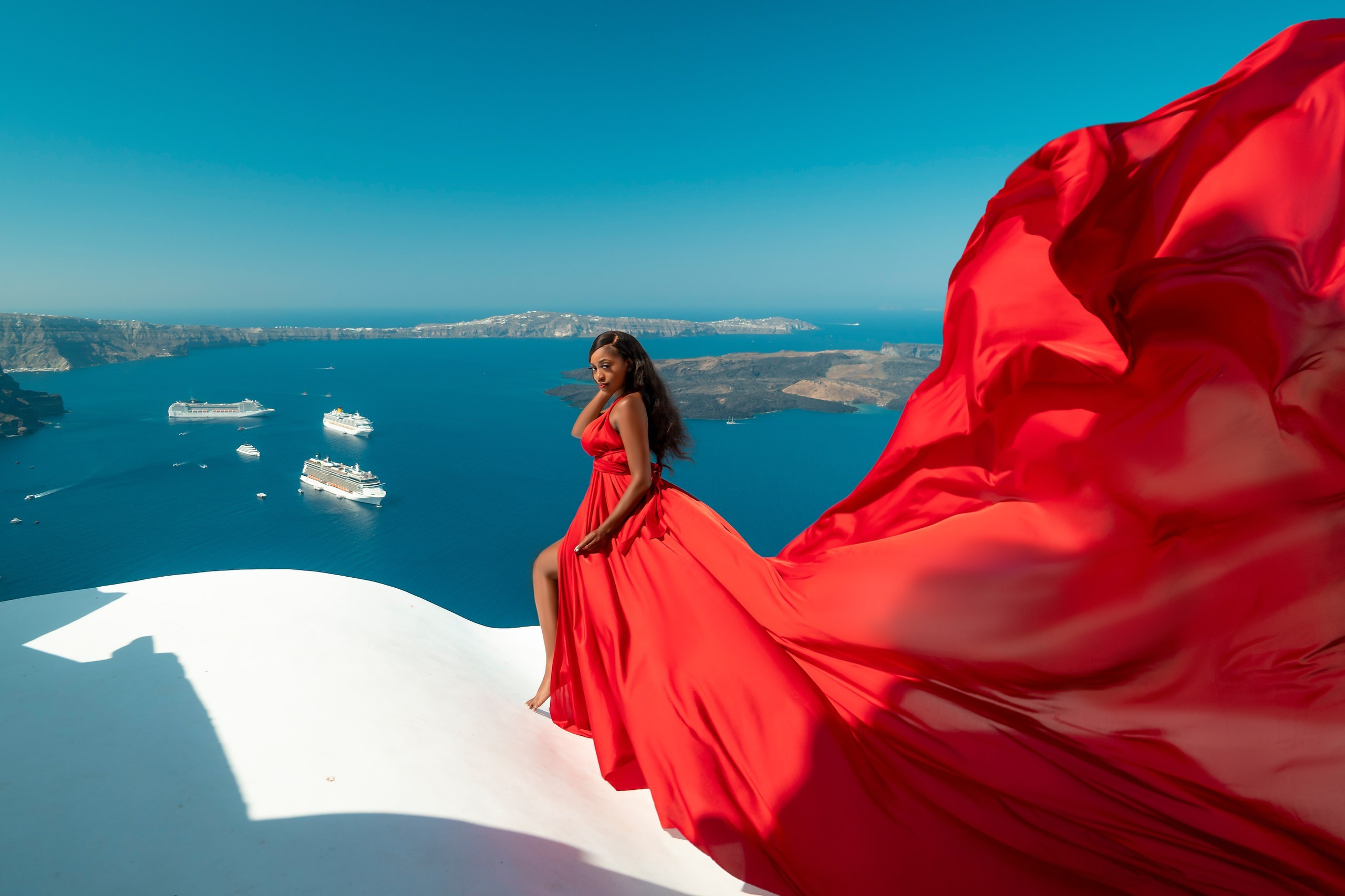 Red Flying Dress Santorini. Photographer in Santorini SokoLOVE Alex| Flying Dress Santorini
