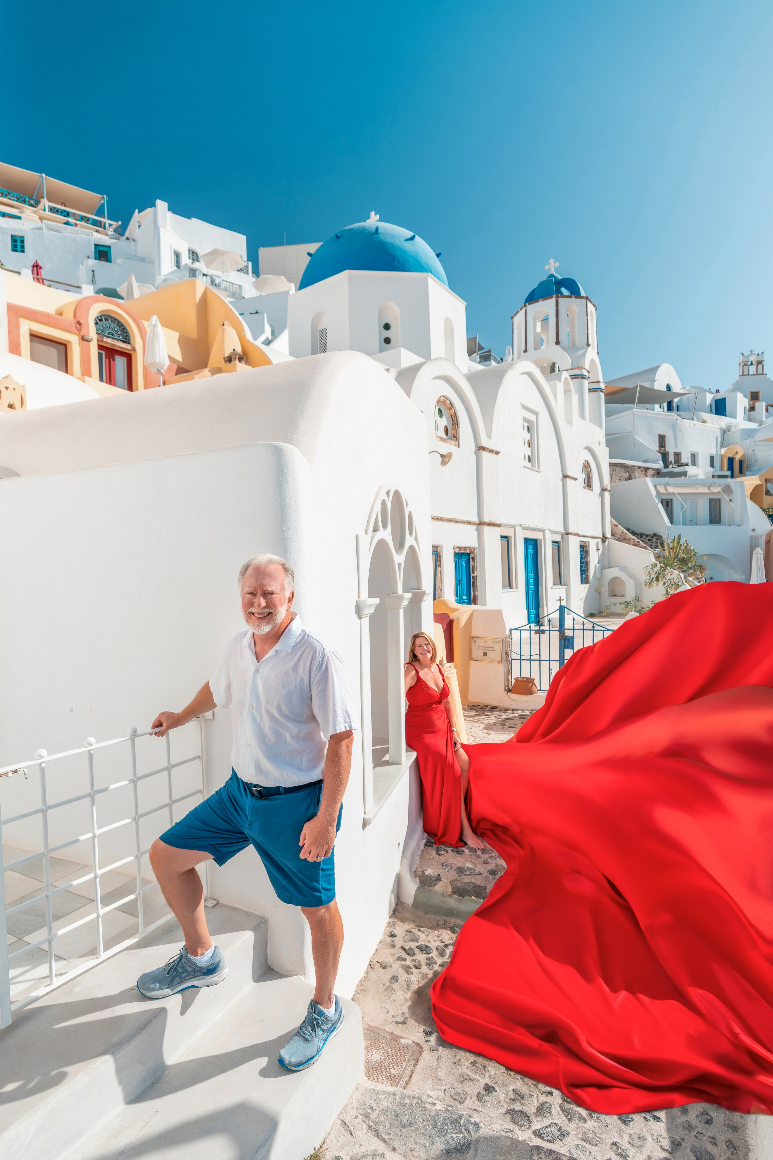 Why a Photoshoot Is the Perfect Way to Celebrate Life’s Biggest Moments in Santorini. Photographer in Santorini SokoLOVE Alex| Flying Dress Santorini