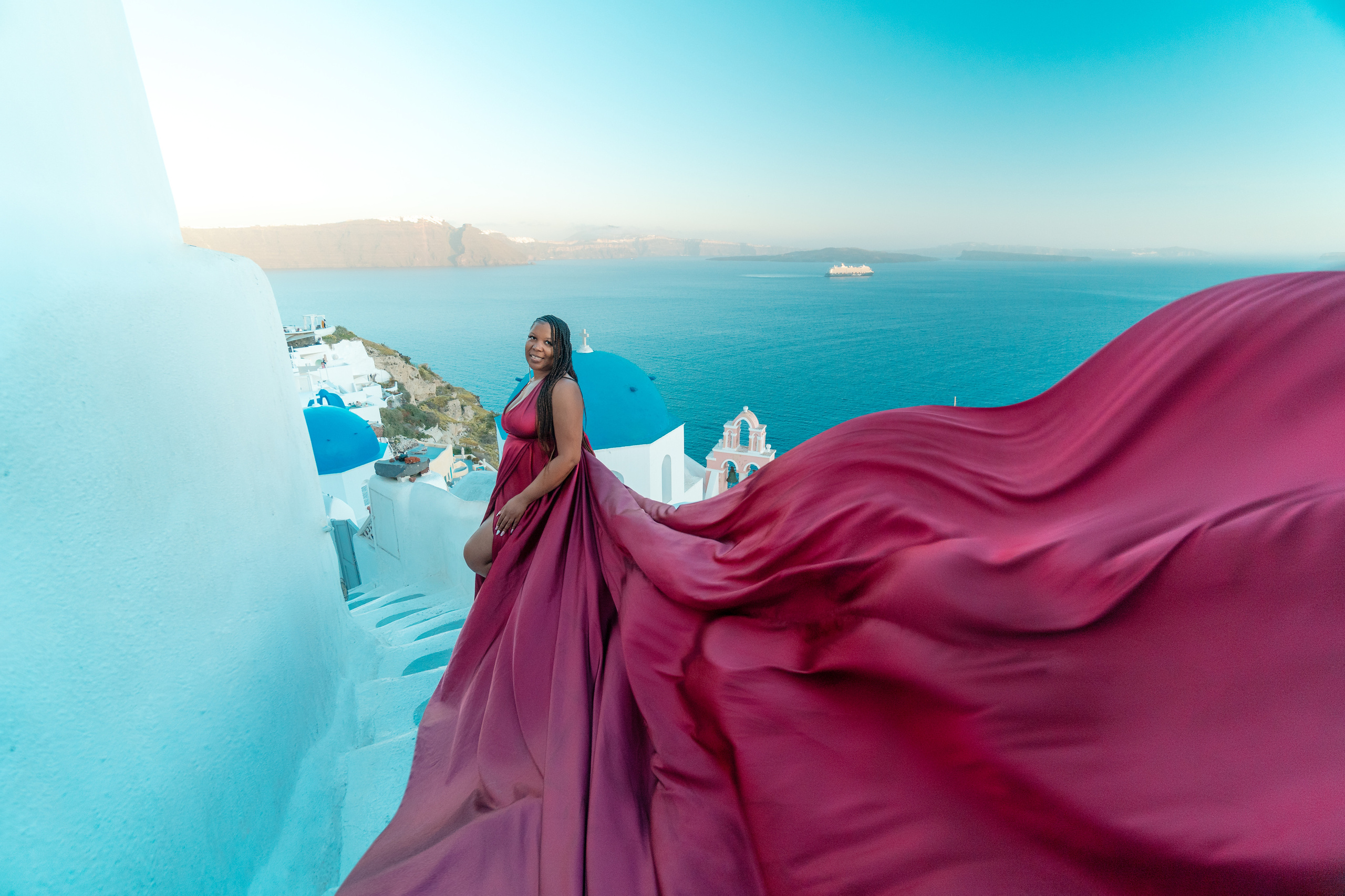 Group photoshoot in flying dress in Oia. Photographer in Santorini SokoLOVE Alex| Flying Dress Santorini