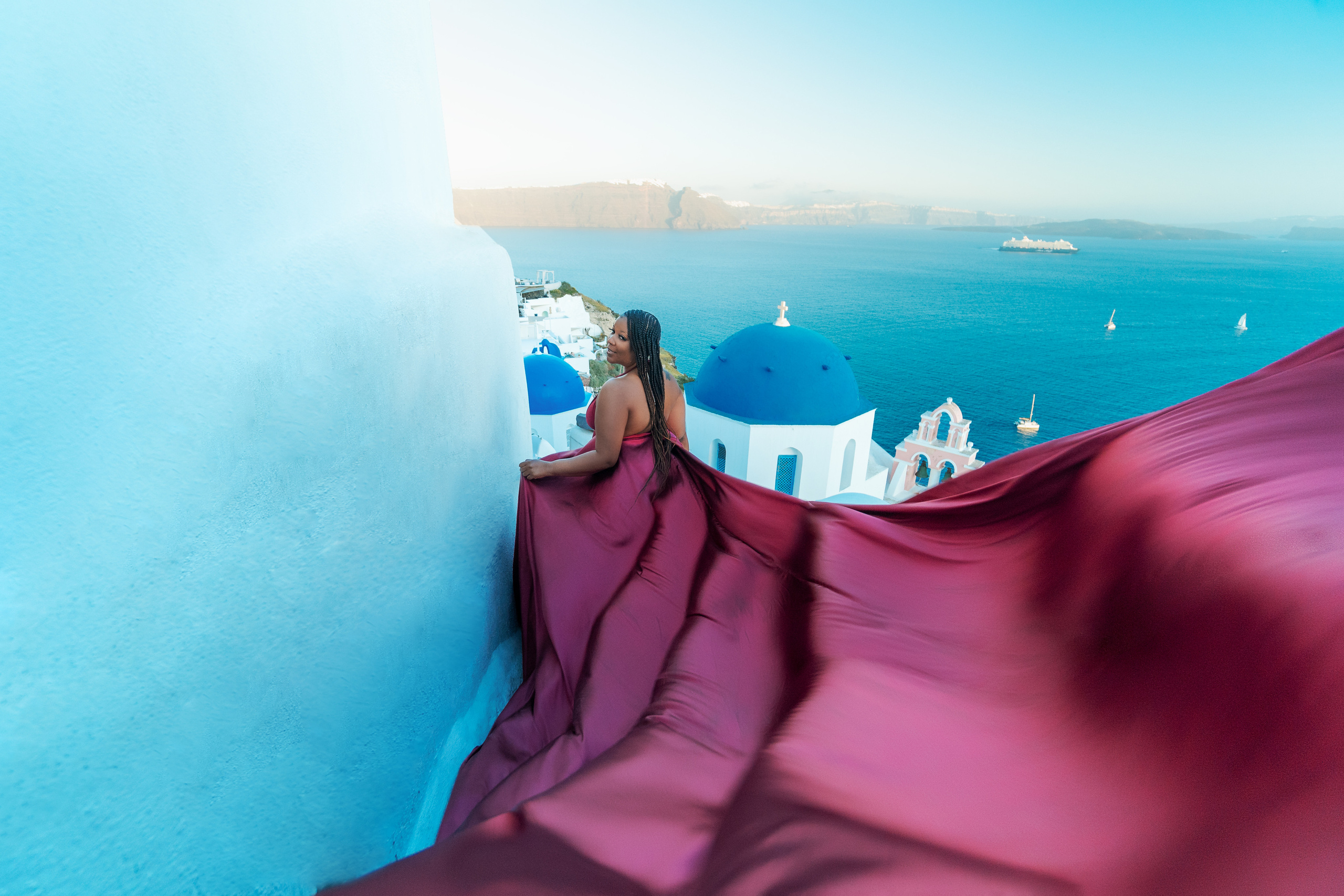 Group photoshoot in flying dress in Oia. Photographer in Santorini SokoLOVE Alex| Flying Dress Santorini