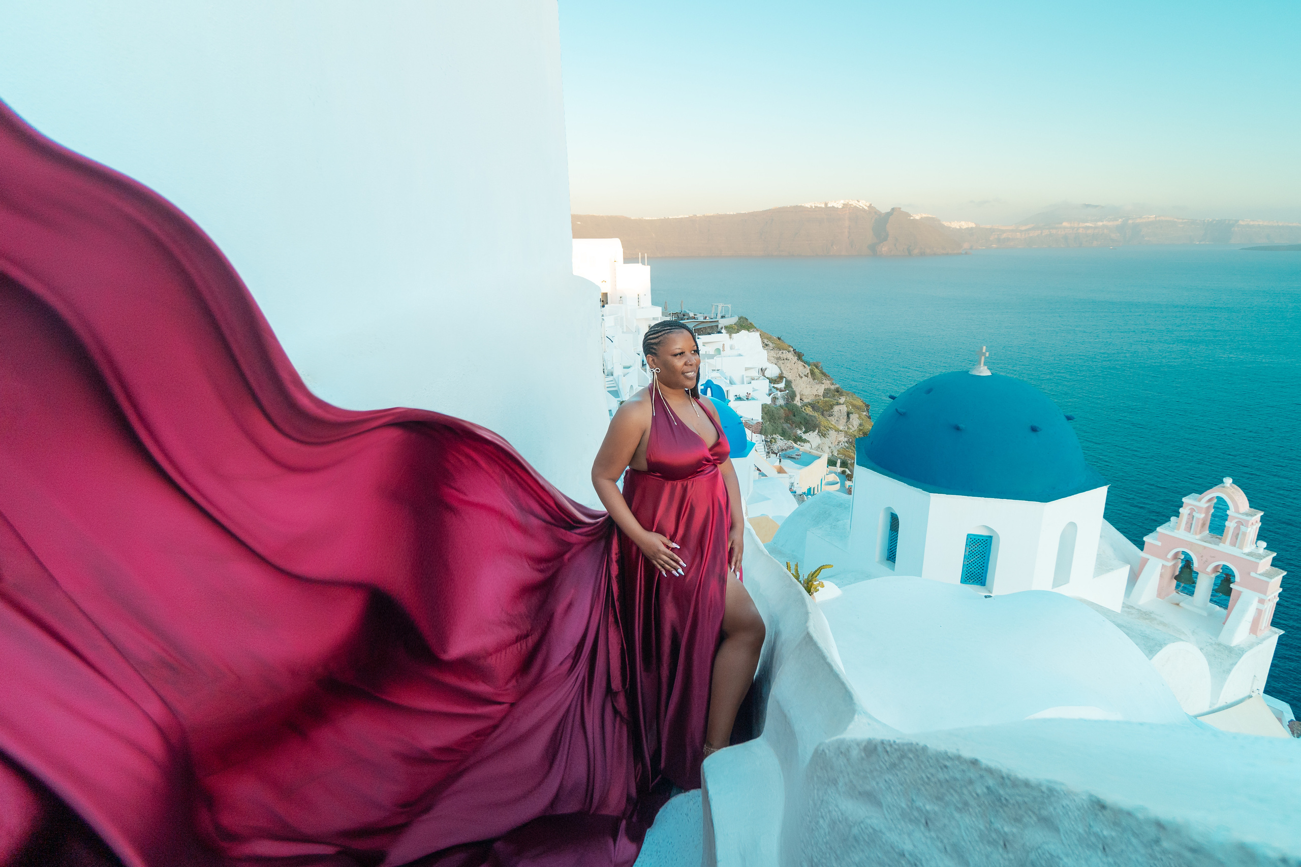 Group photoshoot in flying dress in Oia. Photographer in Santorini SokoLOVE Alex| Flying Dress Santorini
