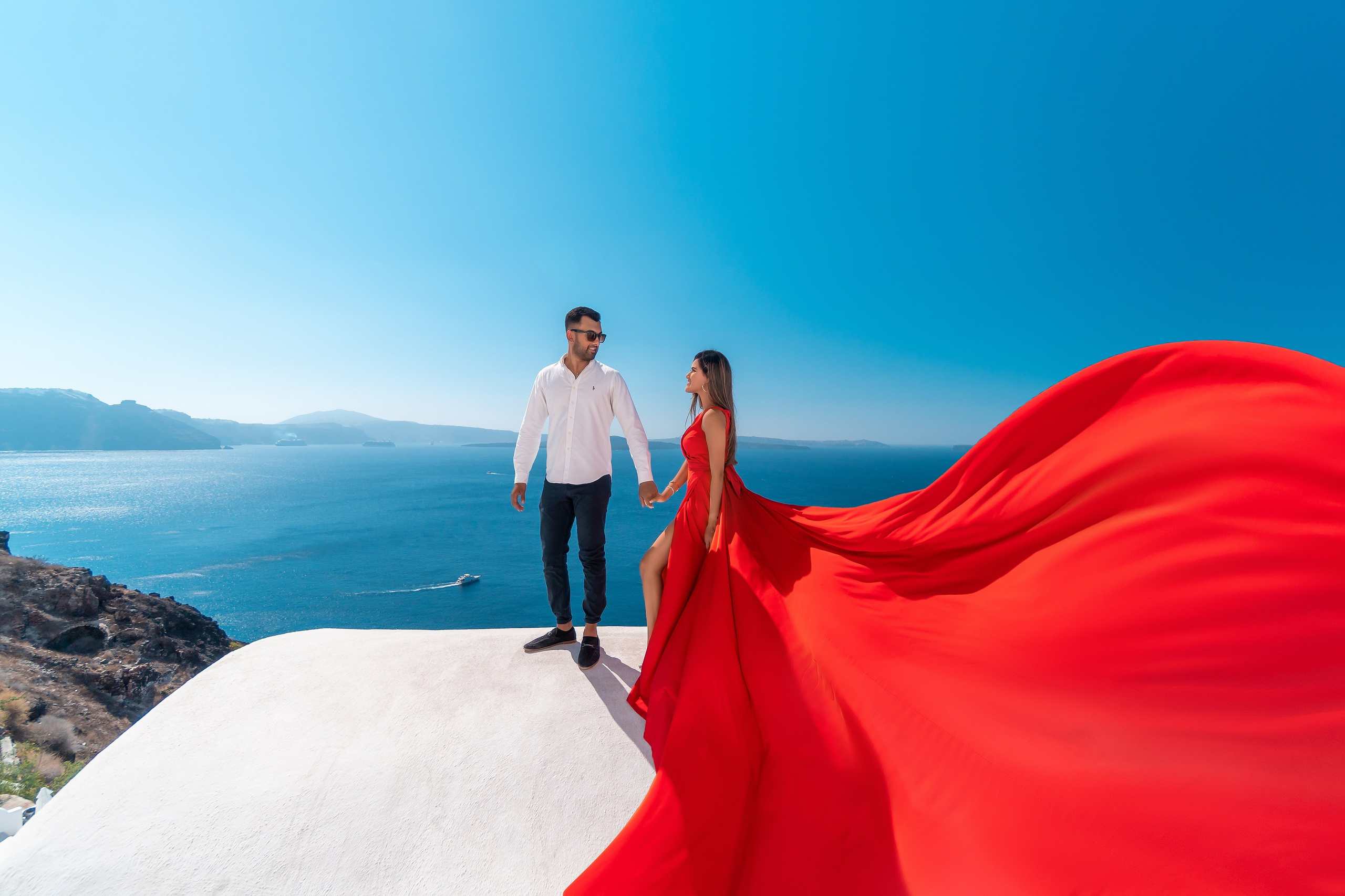 Private Photoshoot in Oia, Santorini | Blue Domes & Caldera Santorini. Flying Dress Santorini Photographer | SokoLOVE — Book 2026