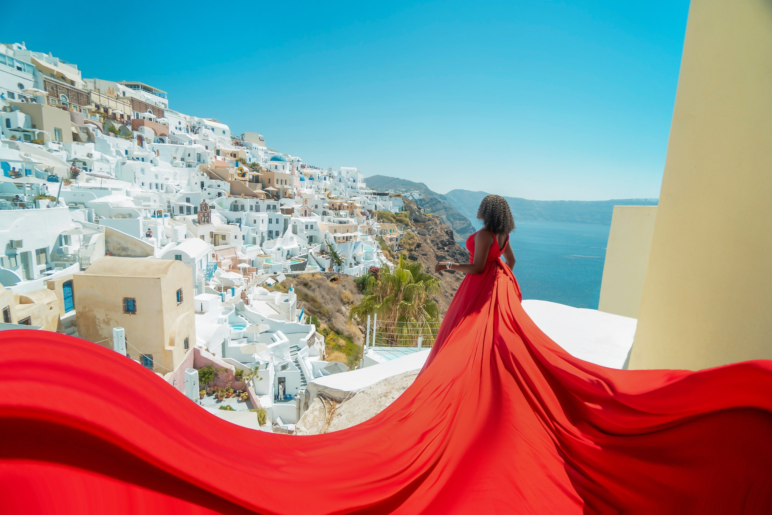 Red Flying Dress Santorini. Photographer in Santorini SokoLOVE Alex| Flying Dress Santorini