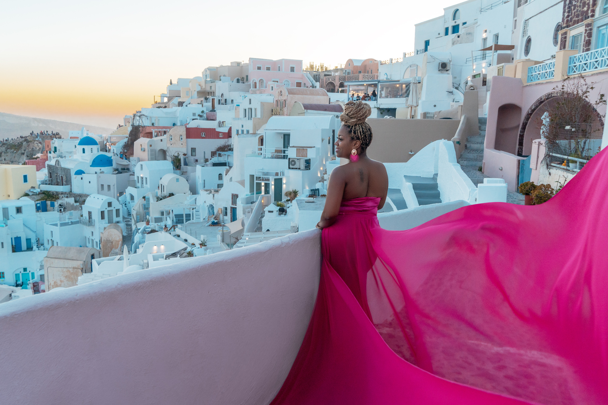 Group photoshoot in flying dress in Oia. Photographer in Santorini SokoLOVE Alex| Flying Dress Santorini