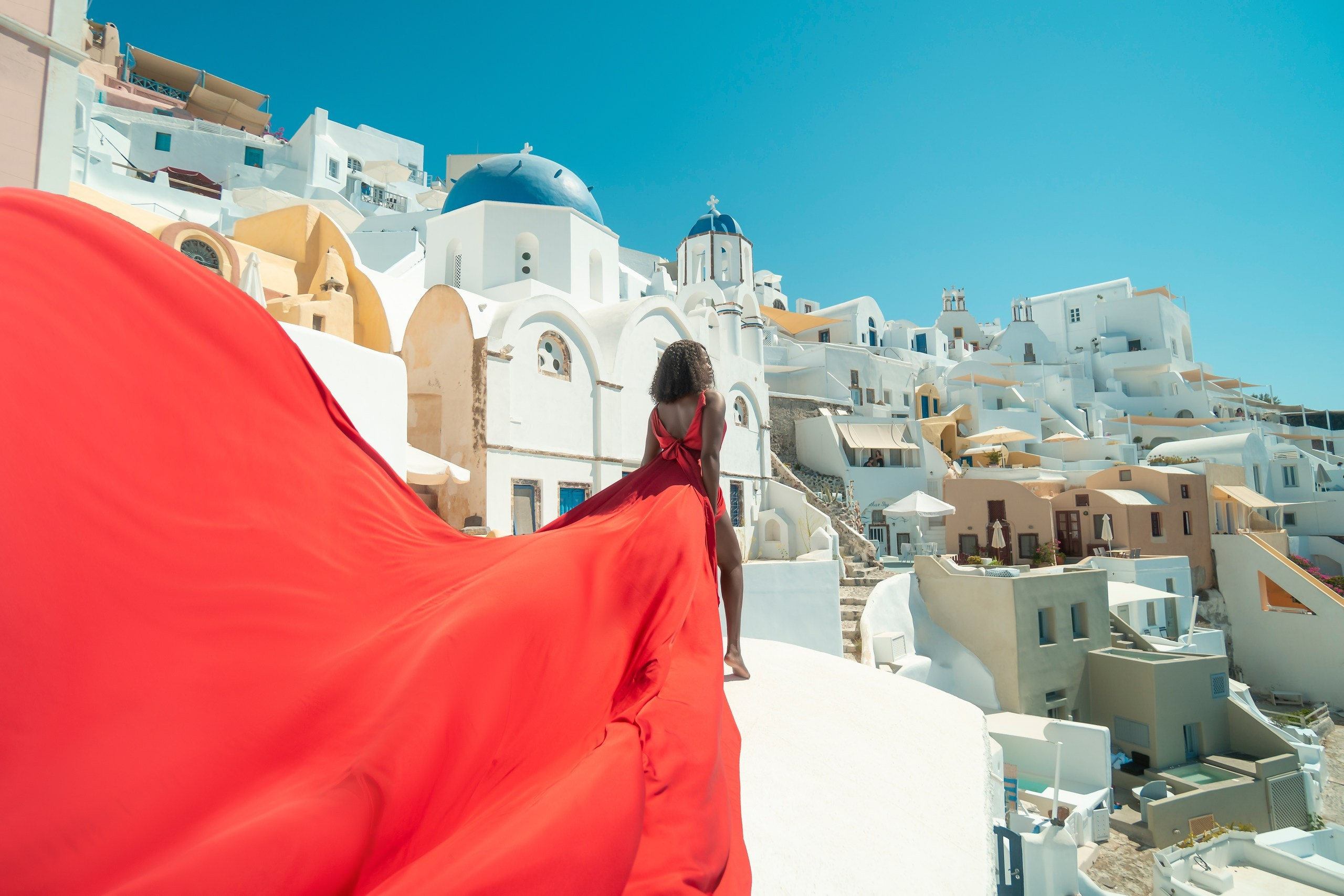 Red Flying Dress Santorini. Photographer in Santorini SokoLOVE Alex| Flying Dress Santorini