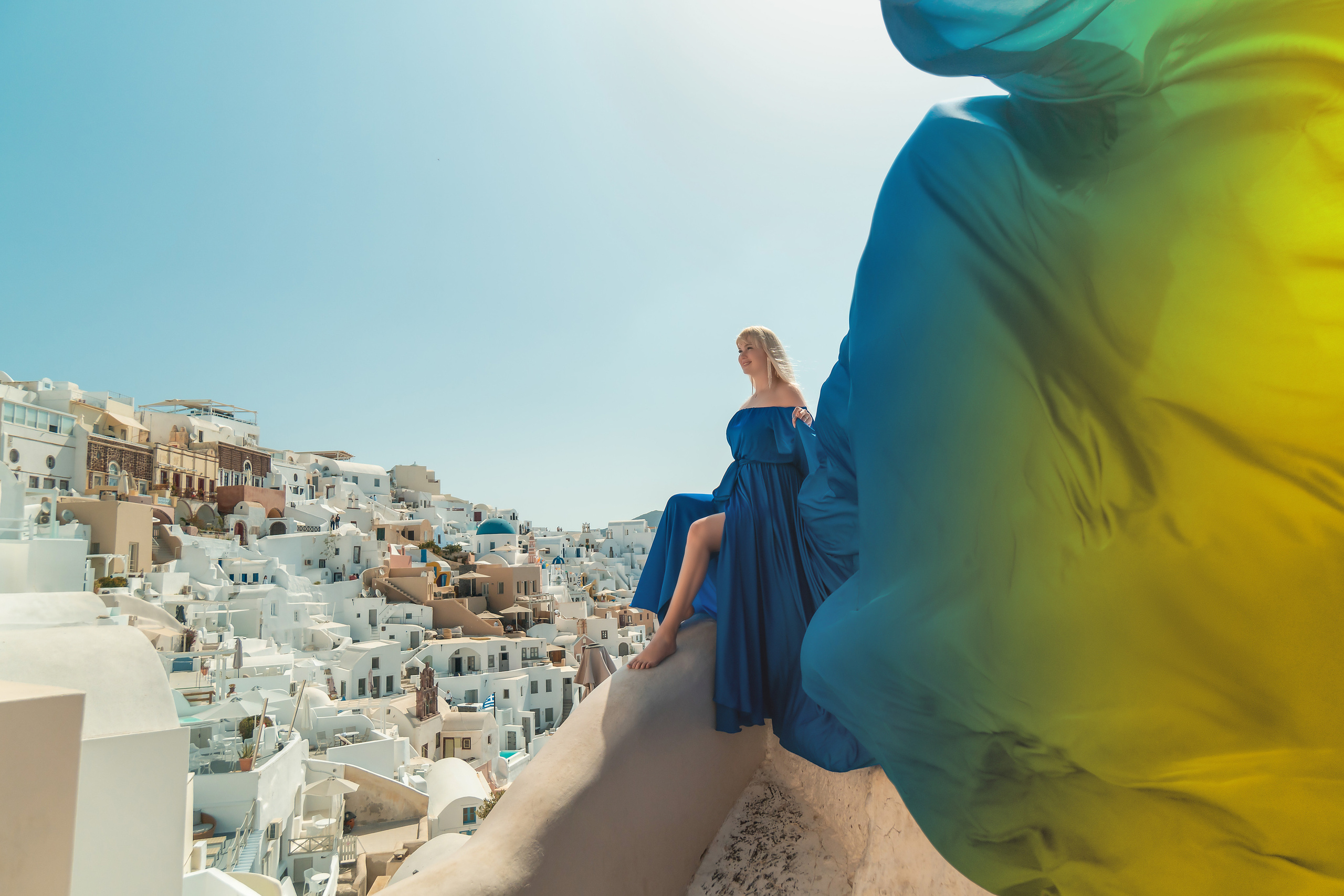 Photo session in Oia, Santorini in the morning. Photographer in Santorini SokoLOVE Alex| Flying Dress Santorini