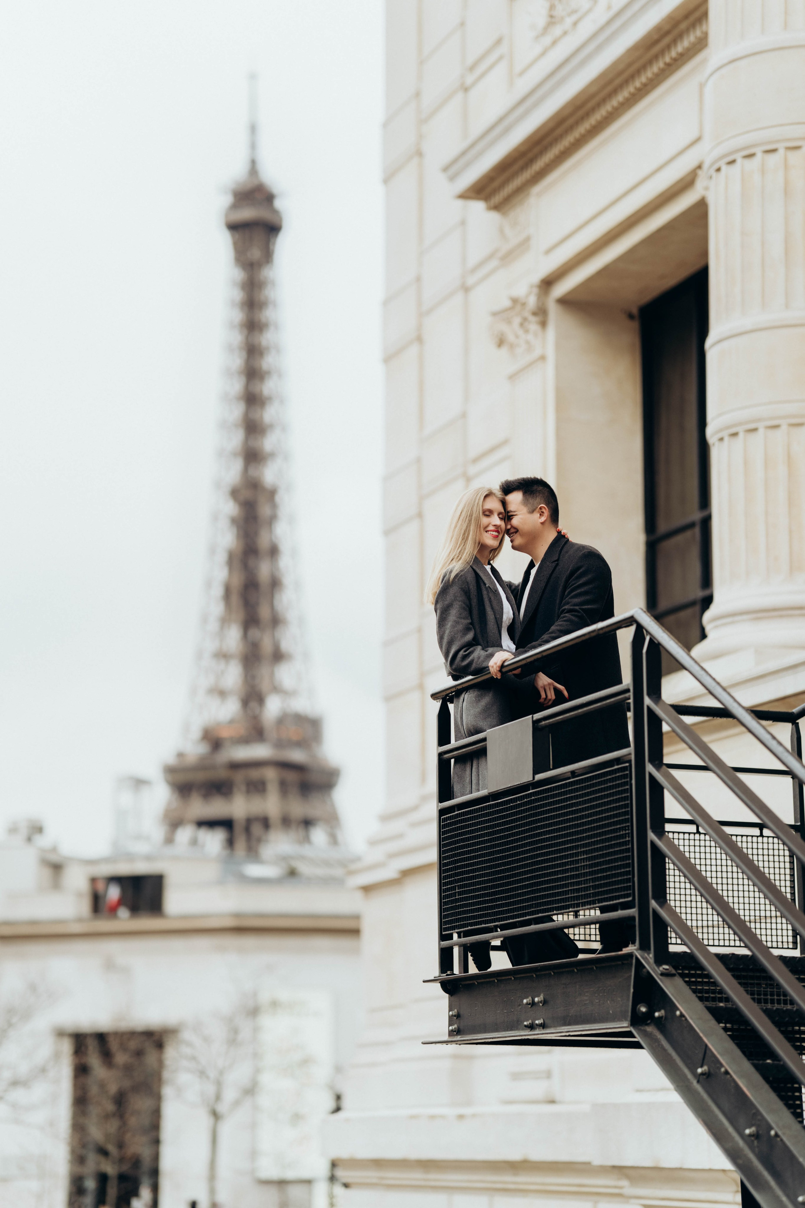 Loving couple during a photo session in a Paris park